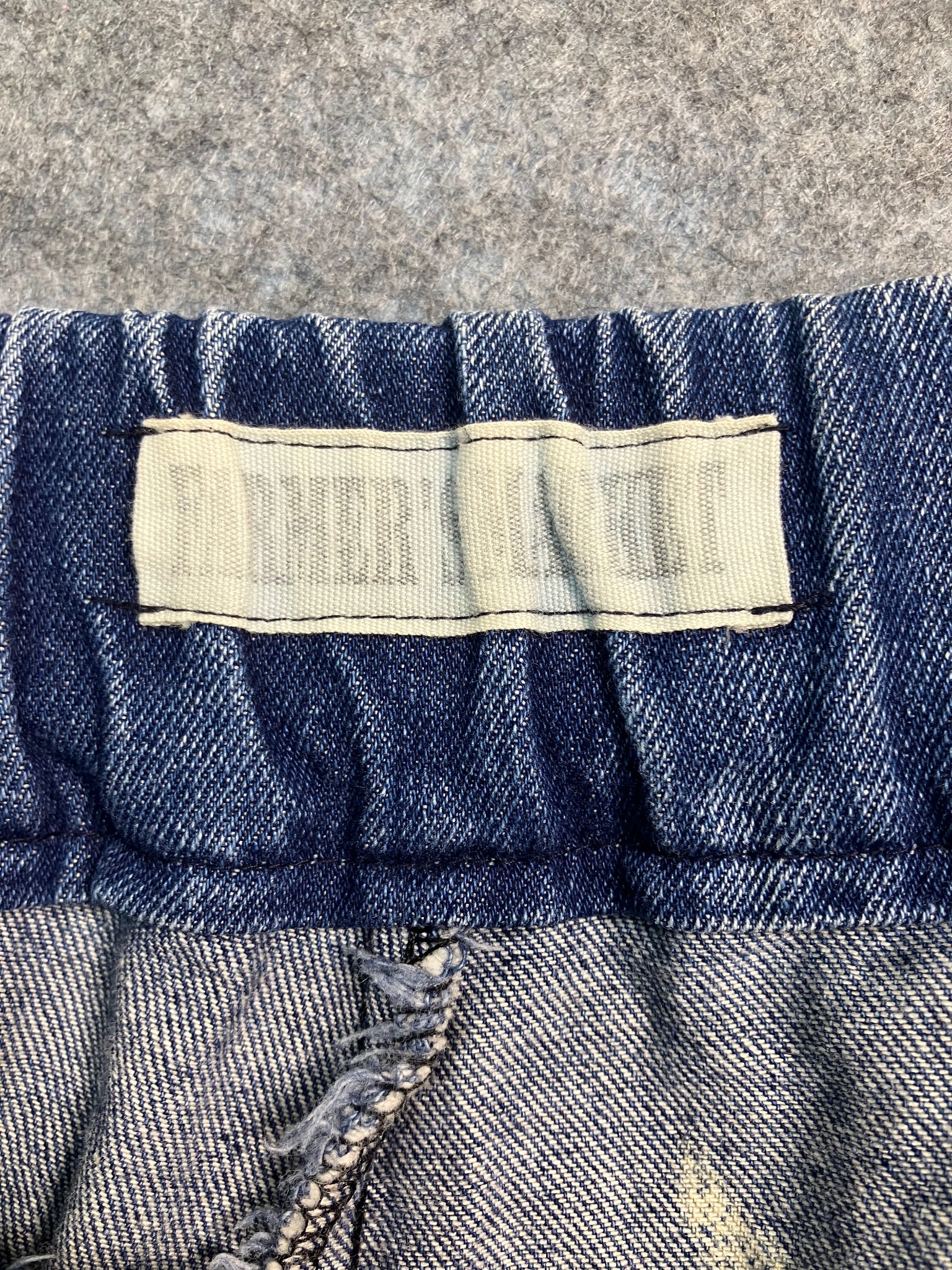 blue paint-stain balloon jeans