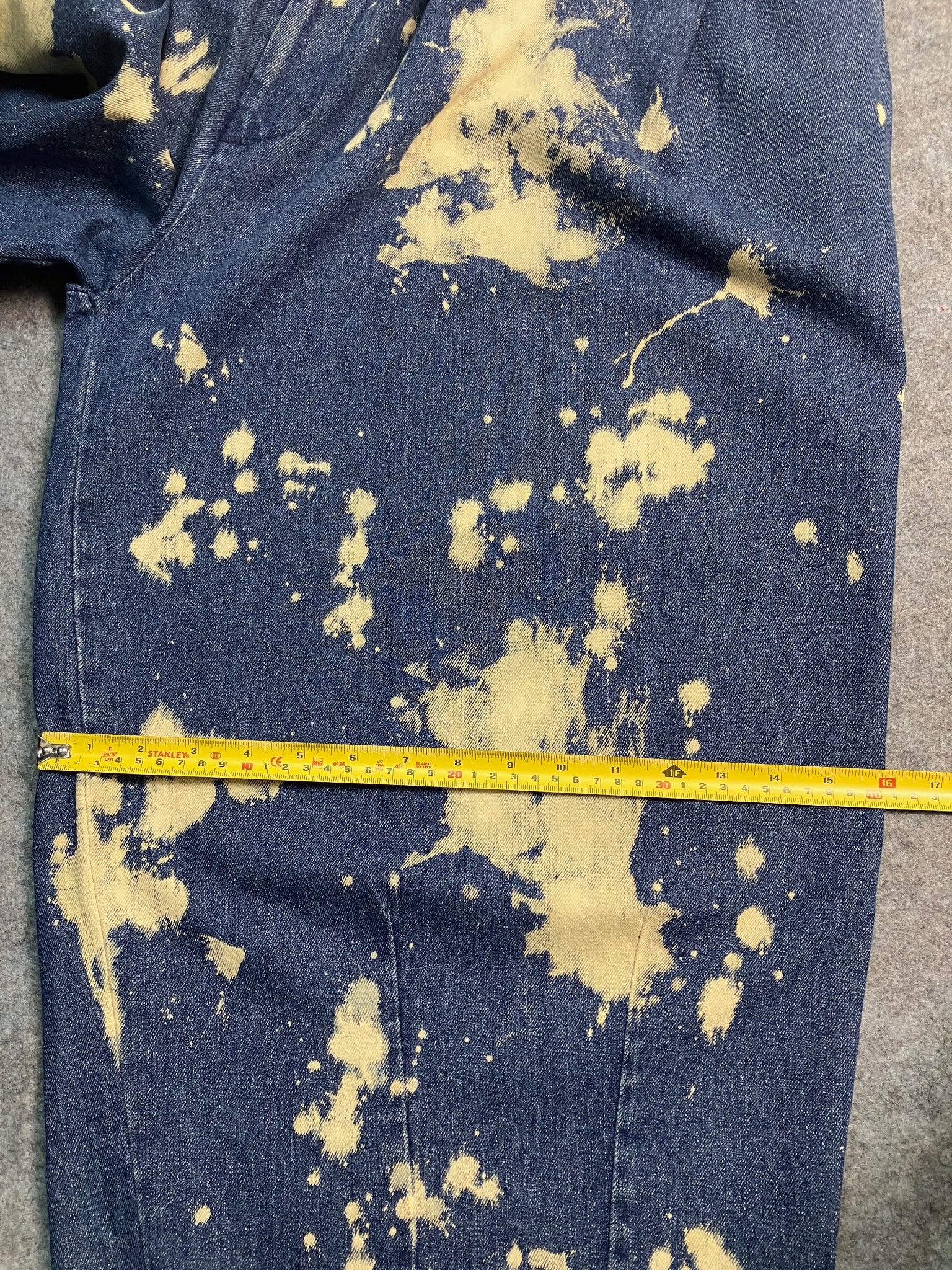 blue paint-stain balloon jeans