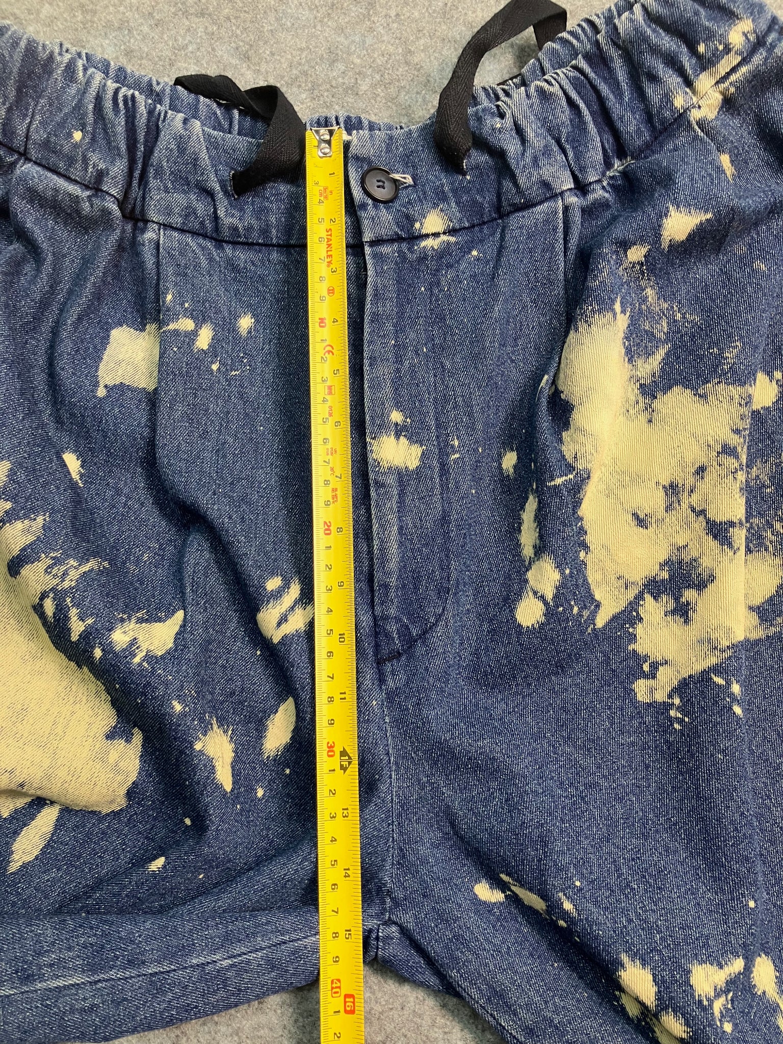 blue paint-stain balloon jeans