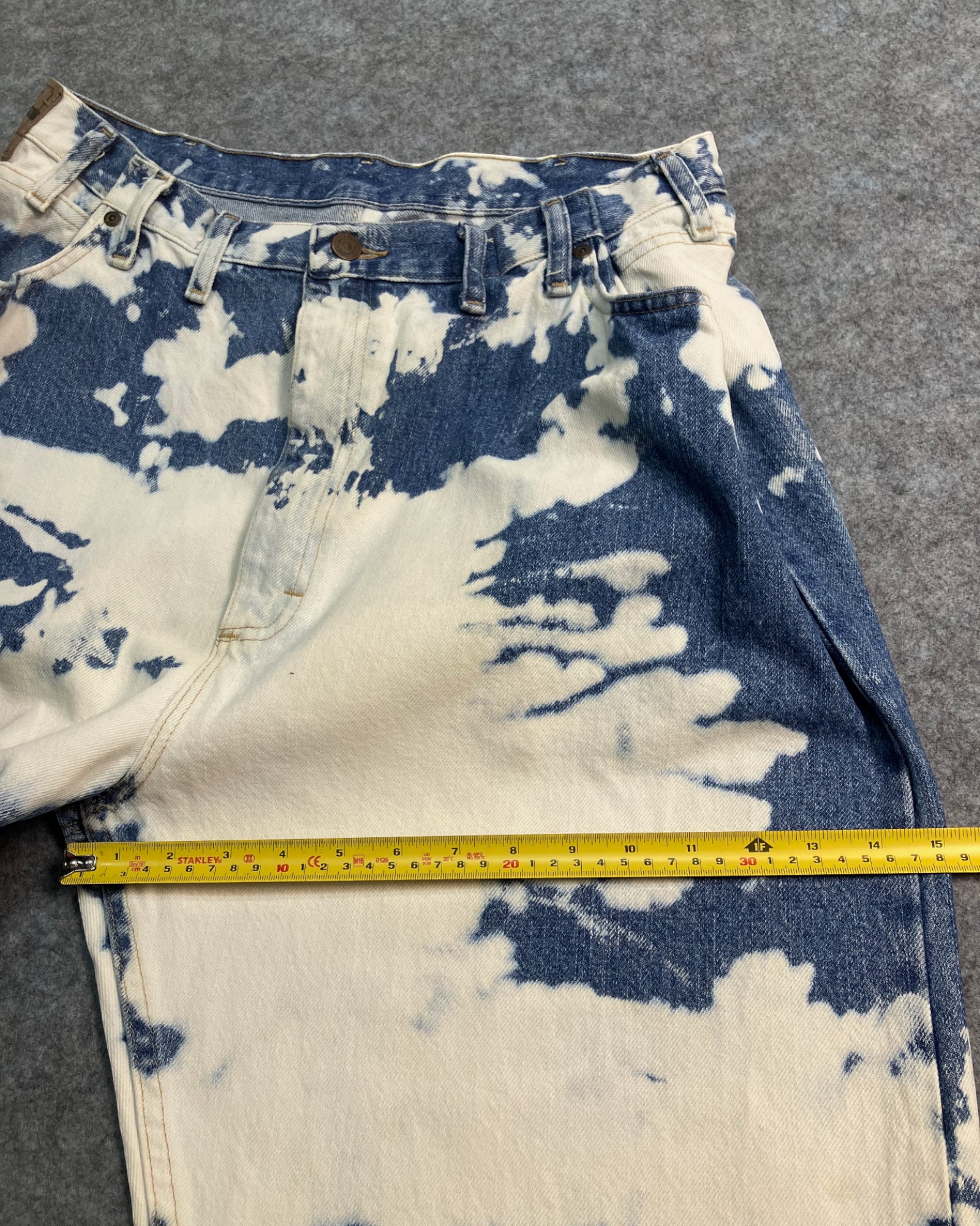 blue reworked paint-stain regular-fit jeans