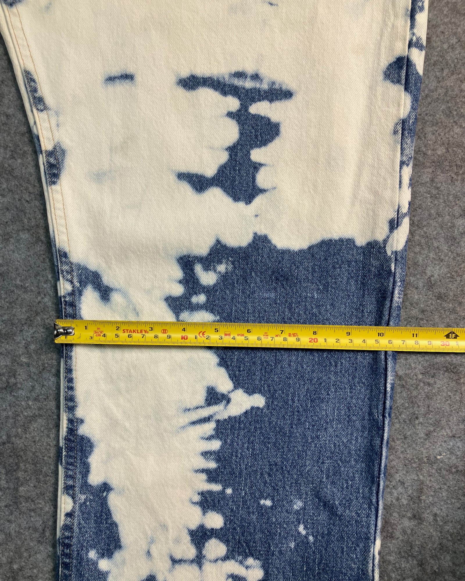 blue reworked paint-stain regular-fit jeans