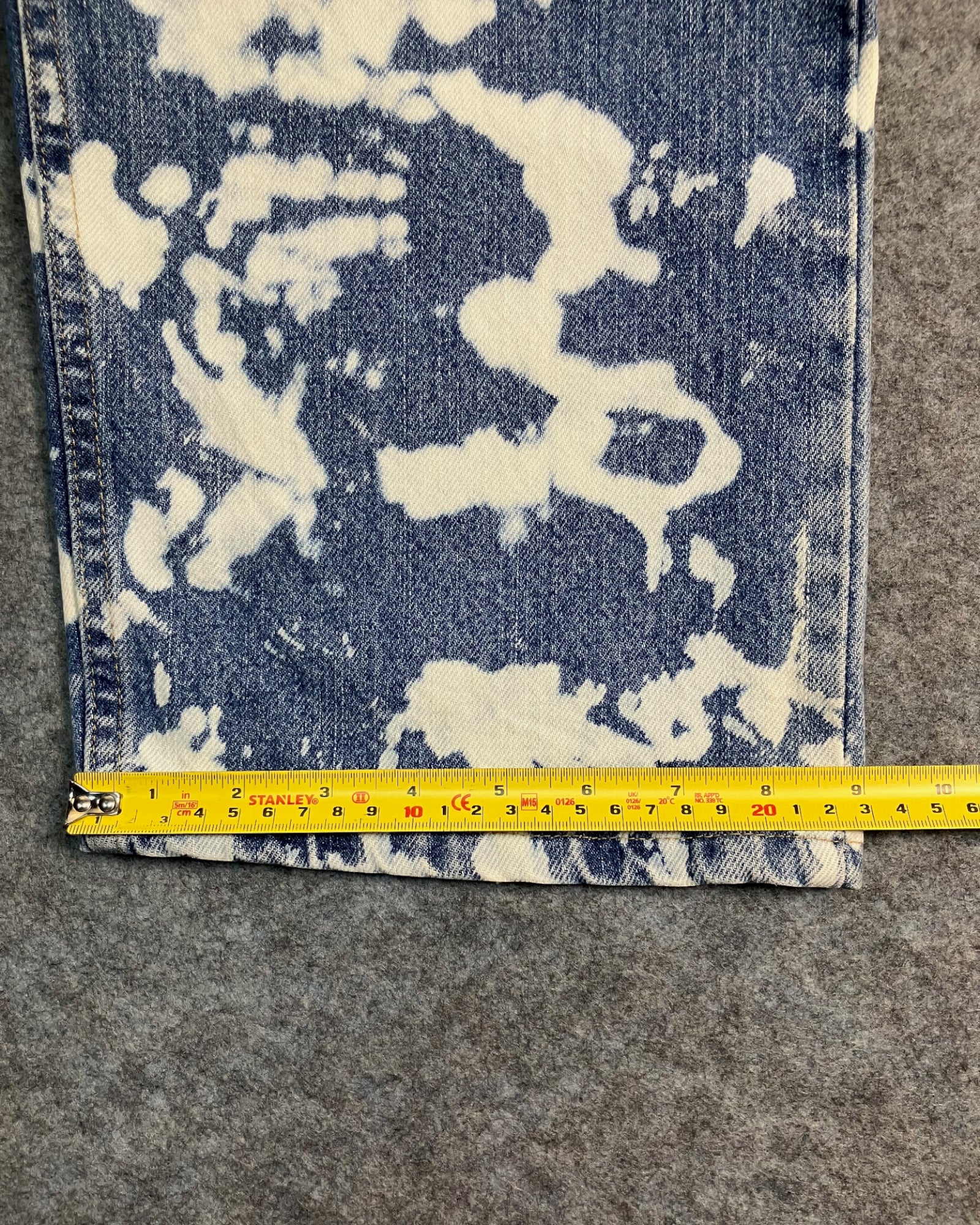 blue reworked paint-stain regular-fit jeans