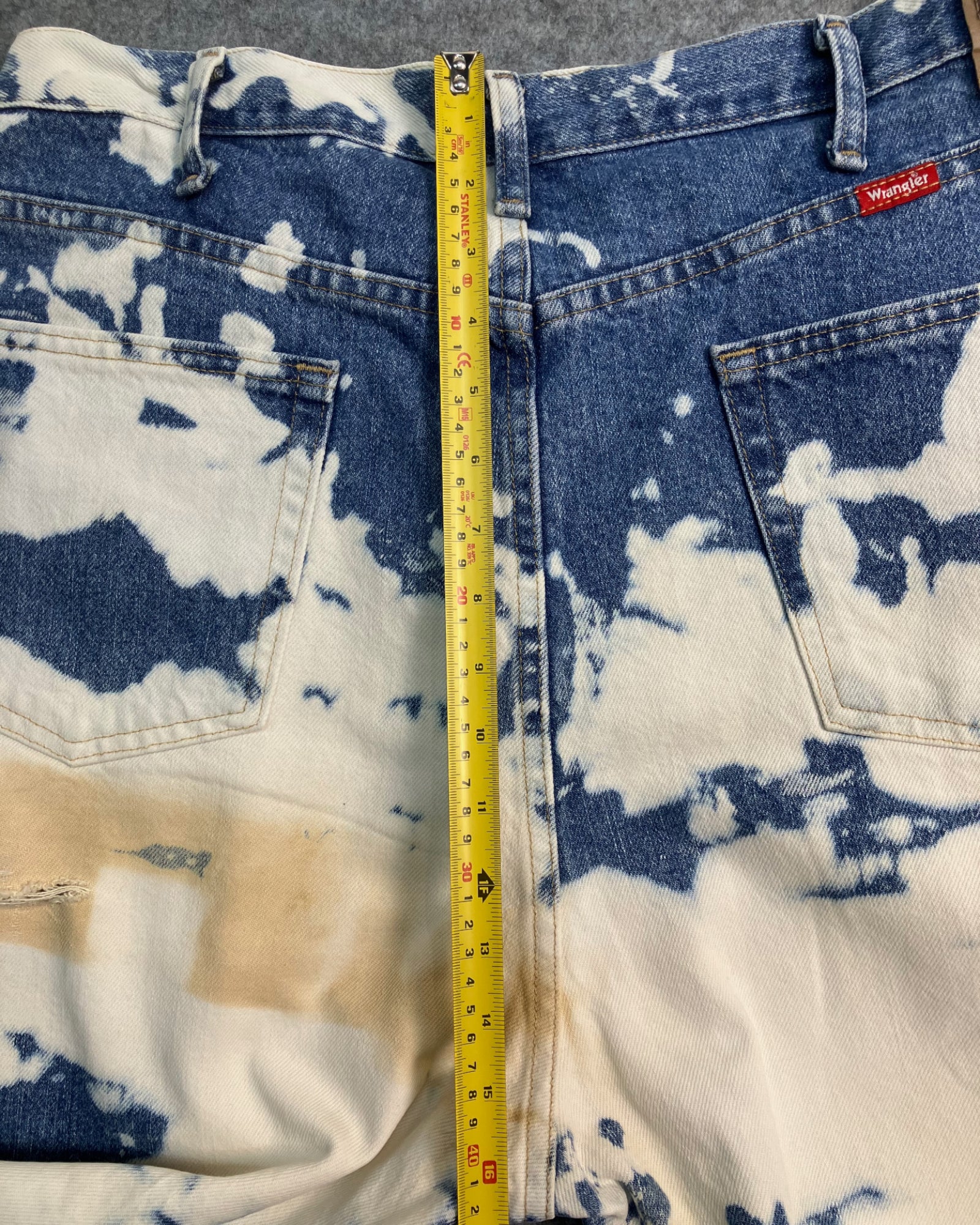blue reworked paint-stain regular-fit jeans