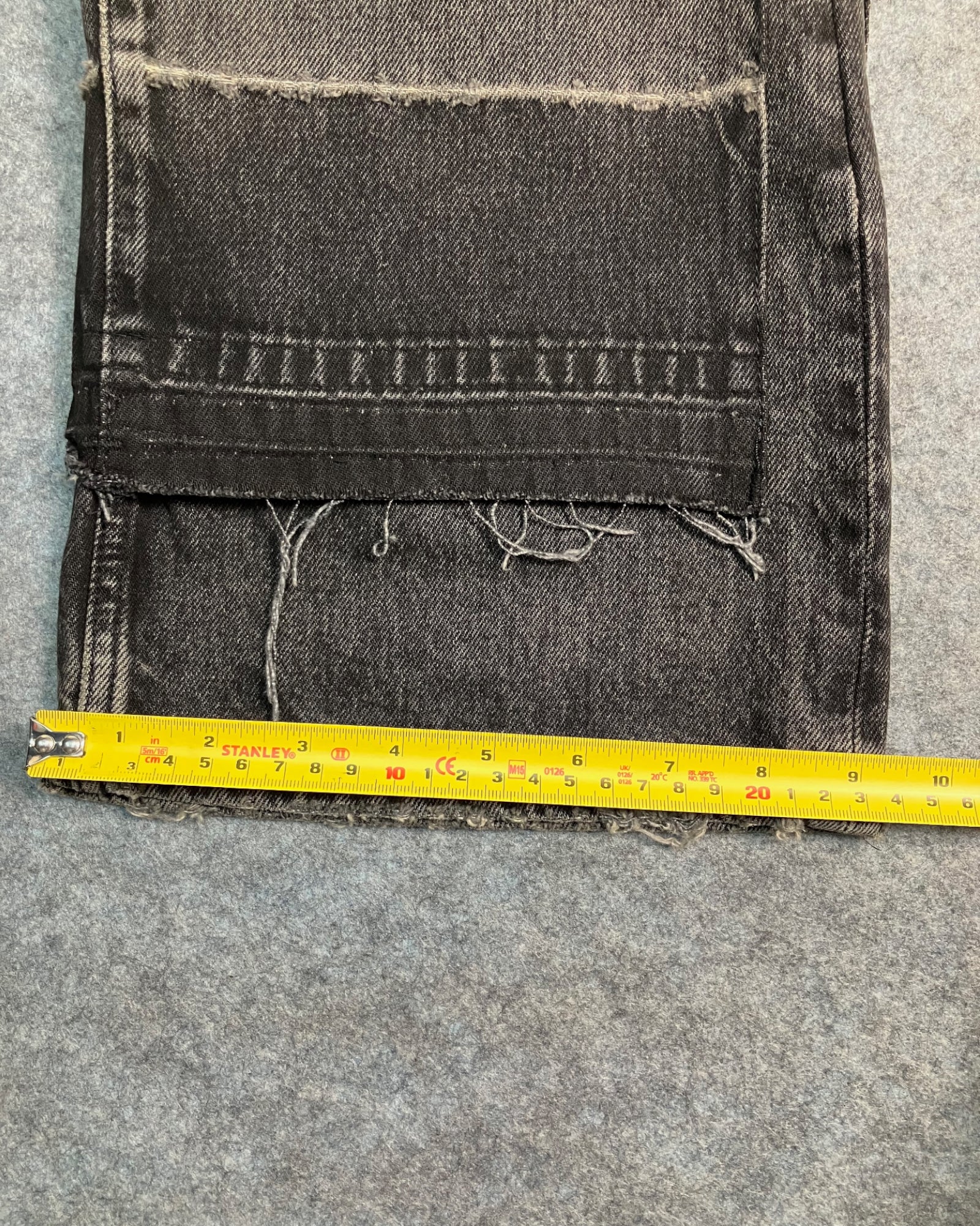 black patched straight-fit jeans