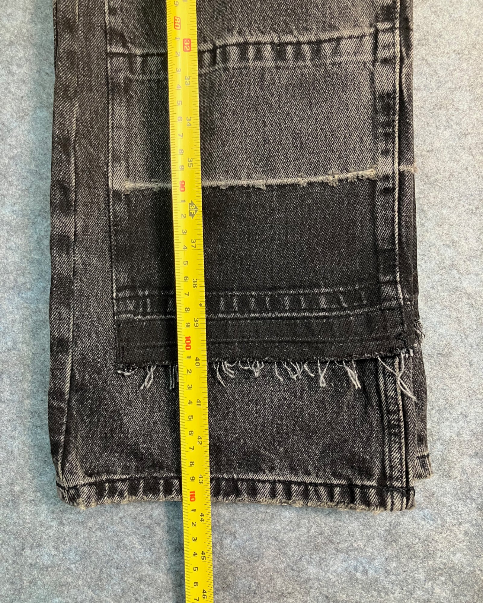 black patched straight-fit jeans