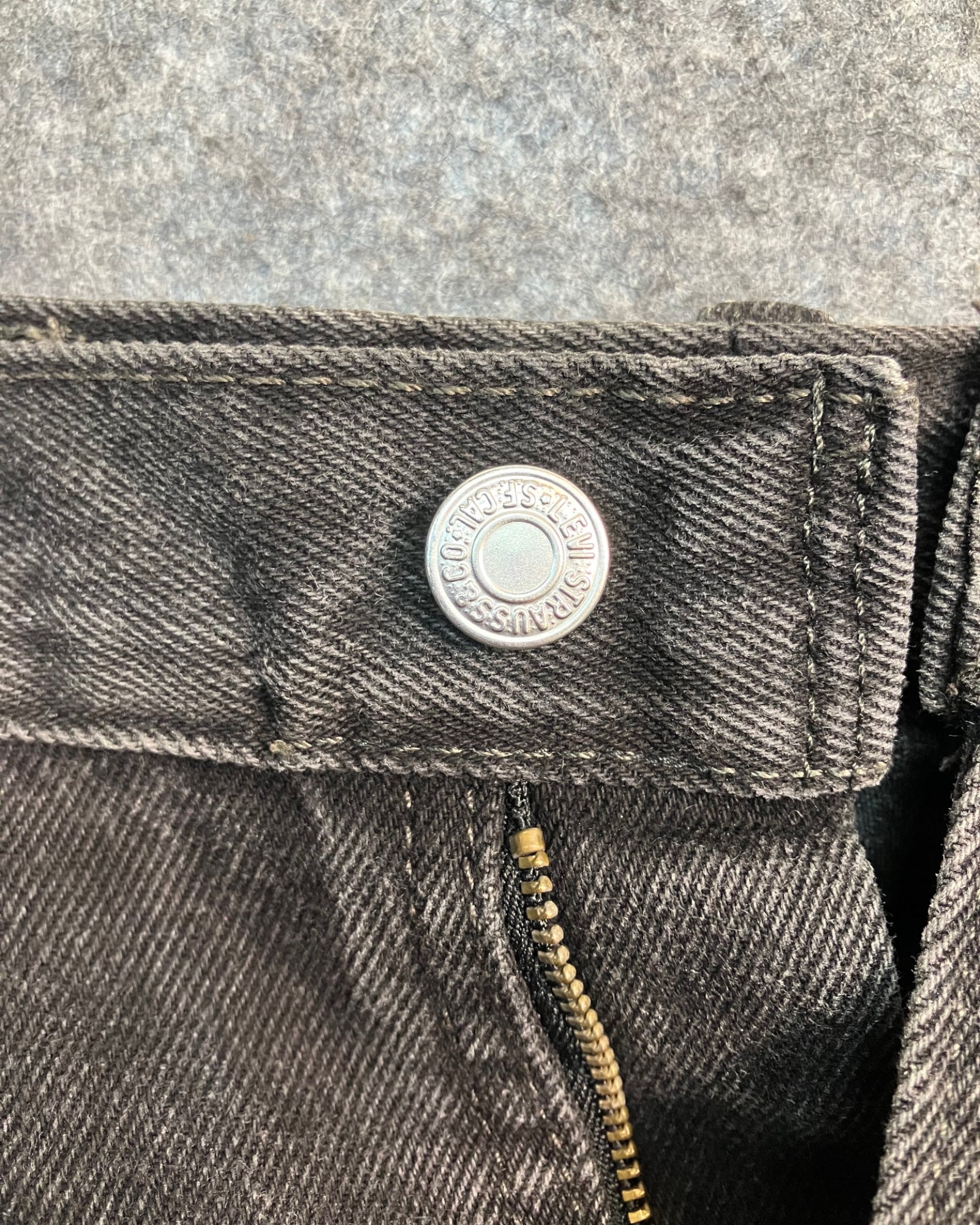 black reworked regular-fit jeans