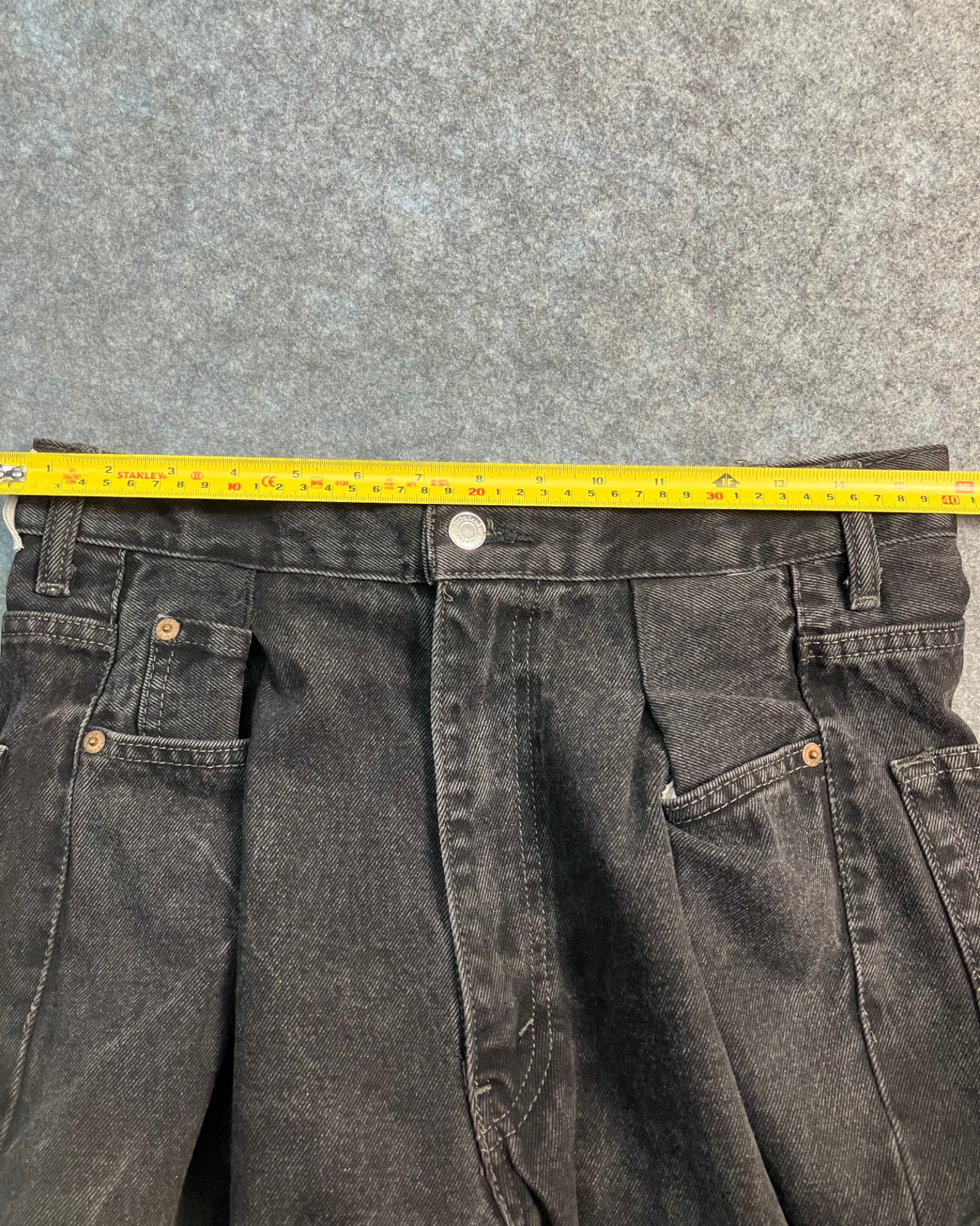 black reworked regular-fit jeans