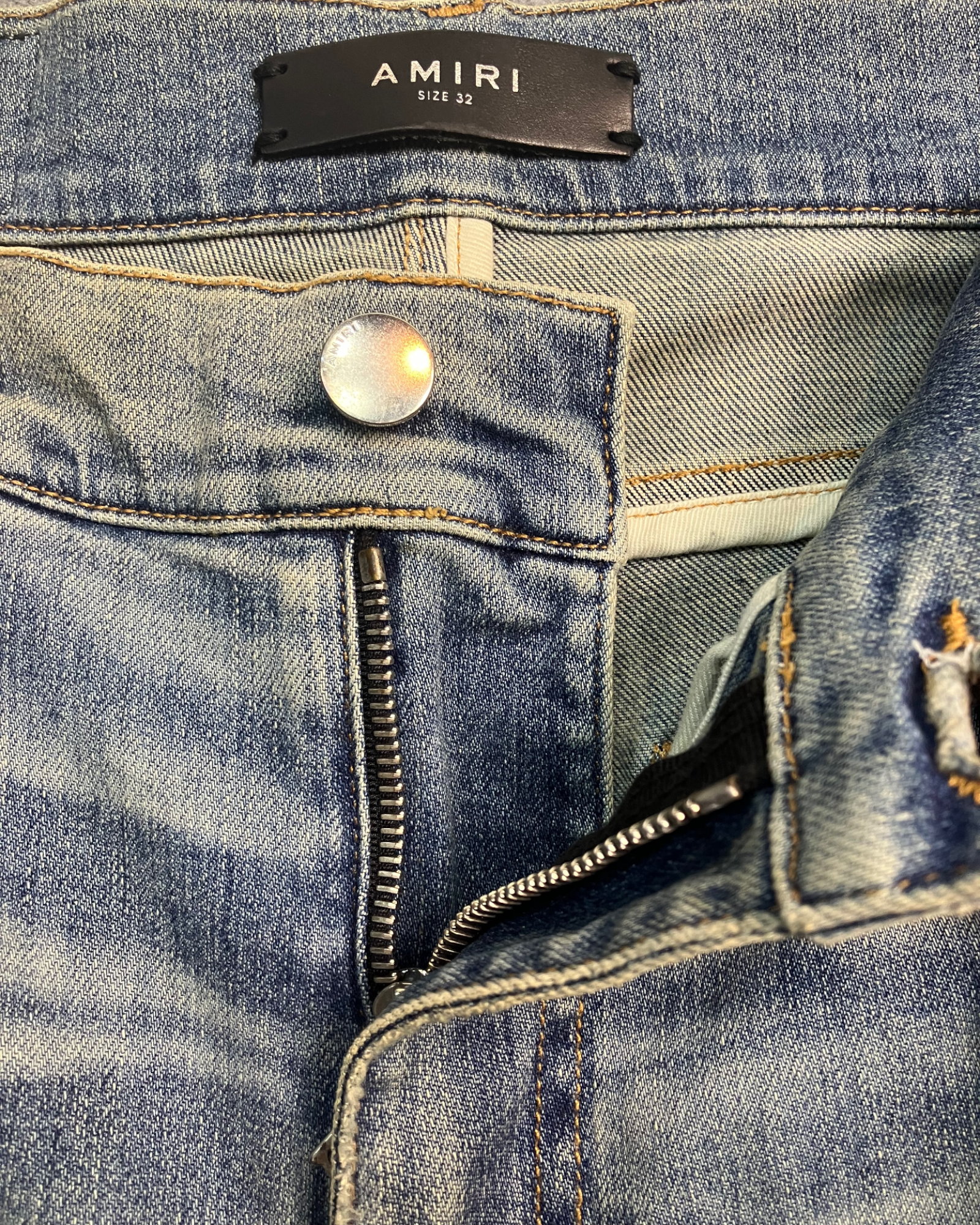 blue distressed slim-fit jeans