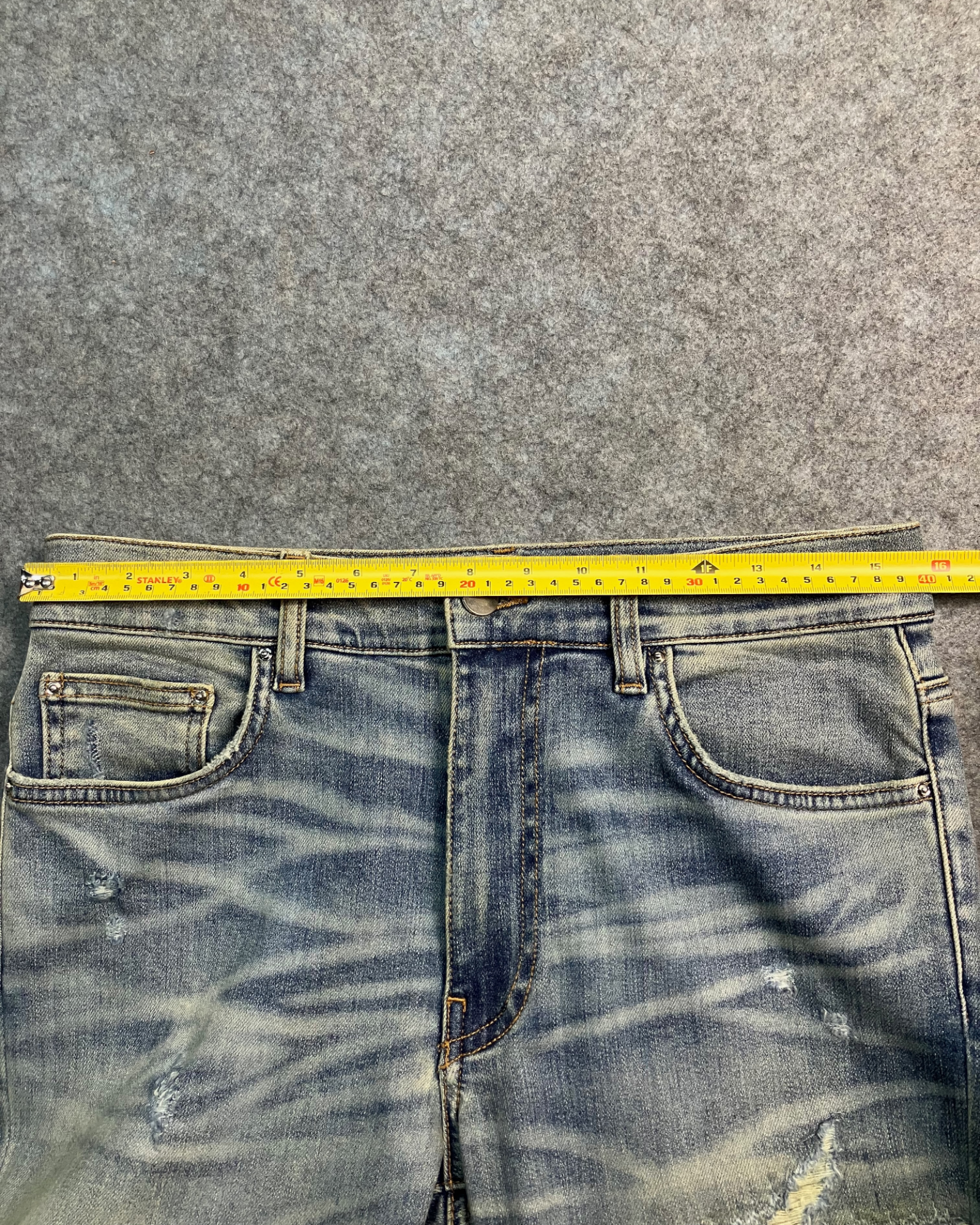 blue distressed slim-fit jeans