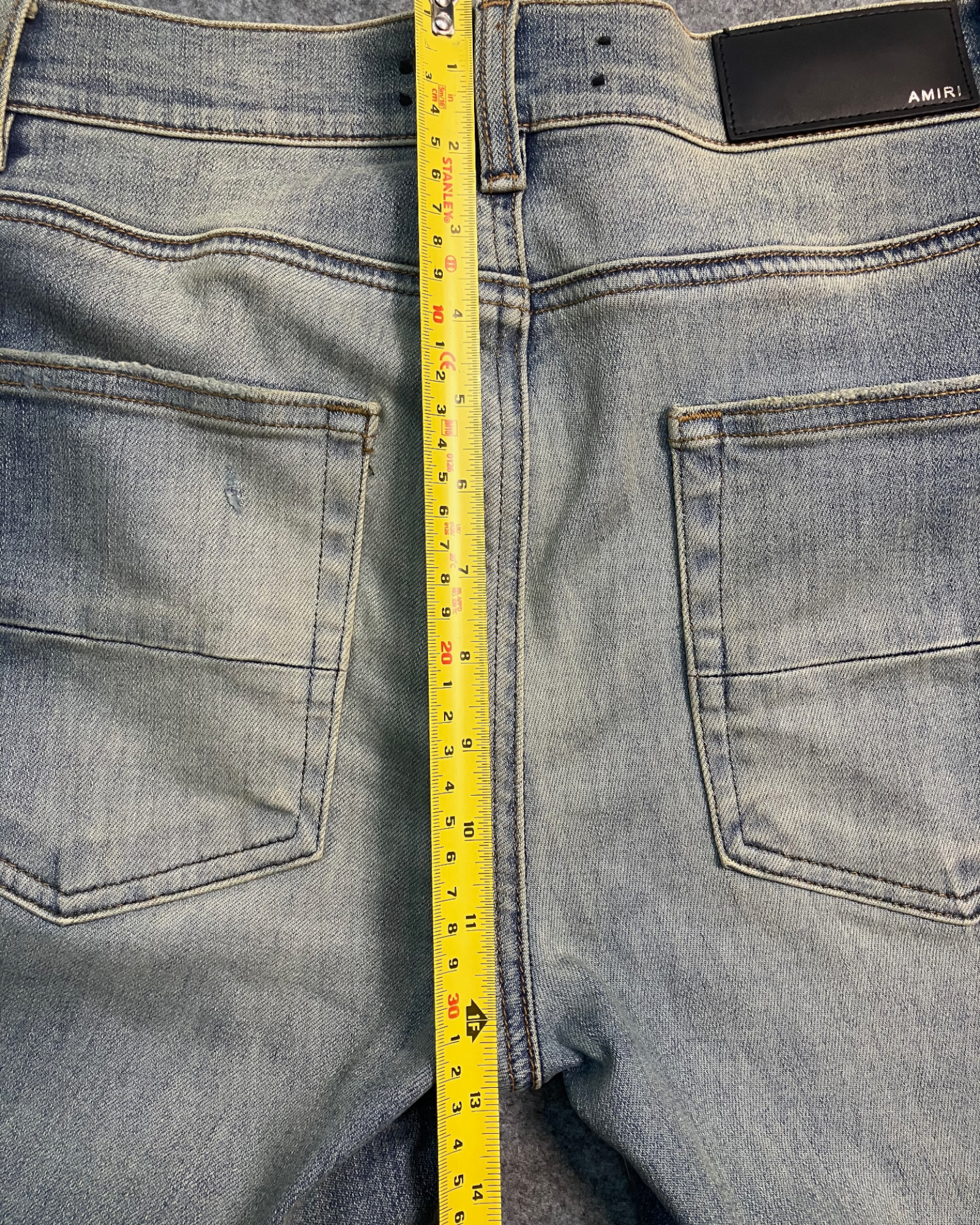 blue distressed slim-fit jeans