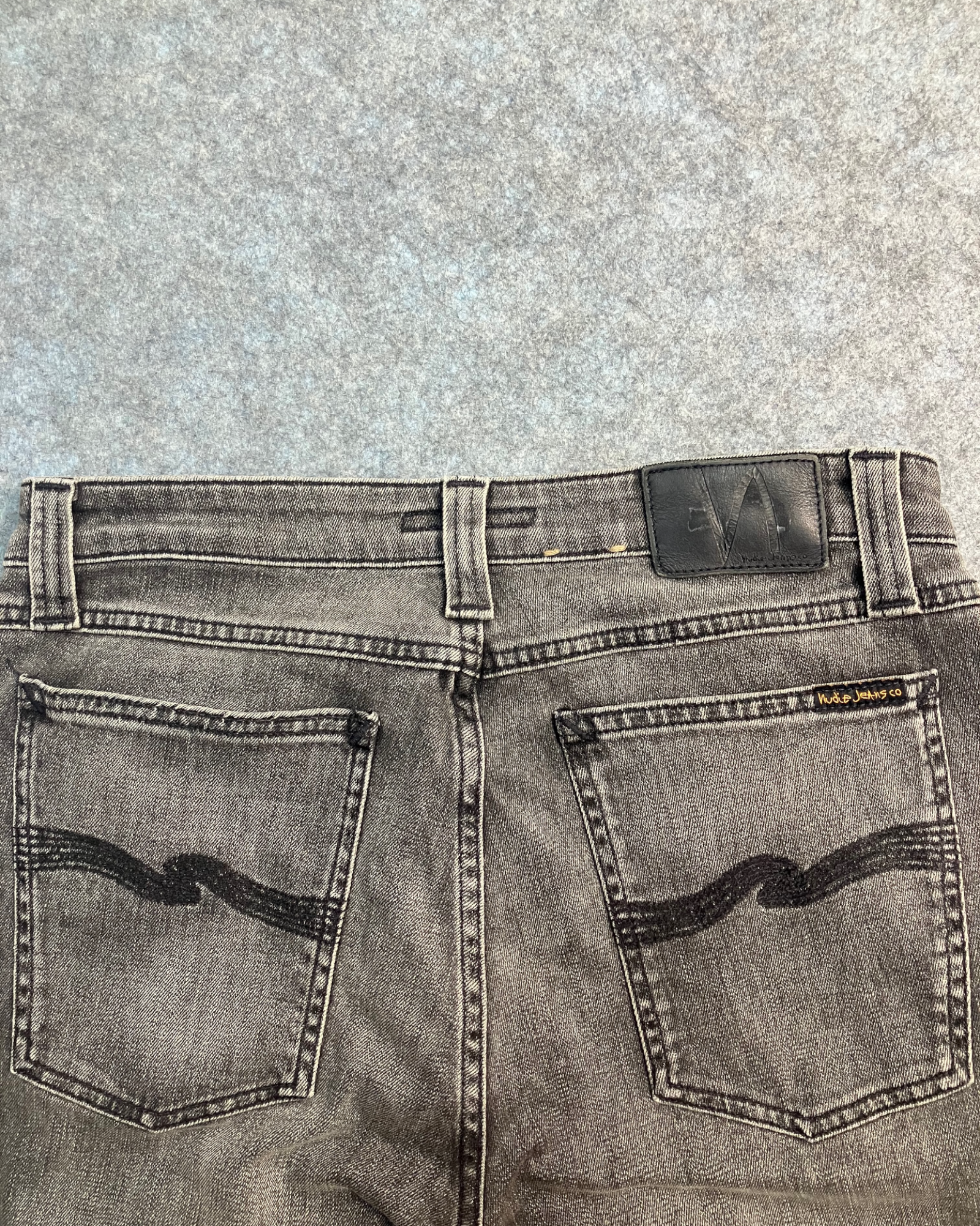 black slim-fit jeans