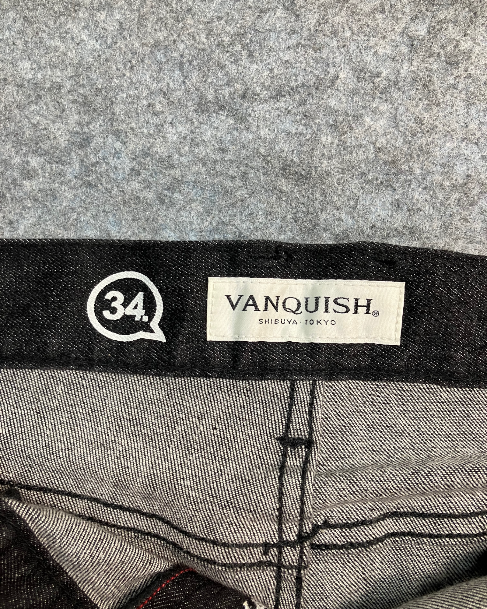 black distressed slim-fit jeans