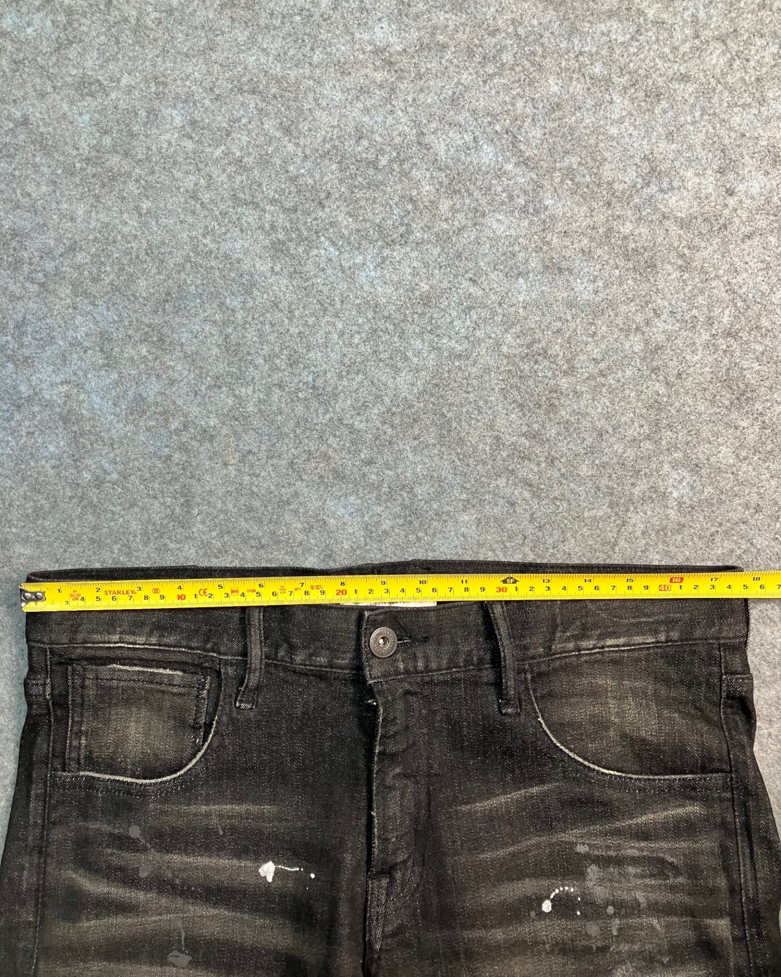 black distressed slim-fit jeans