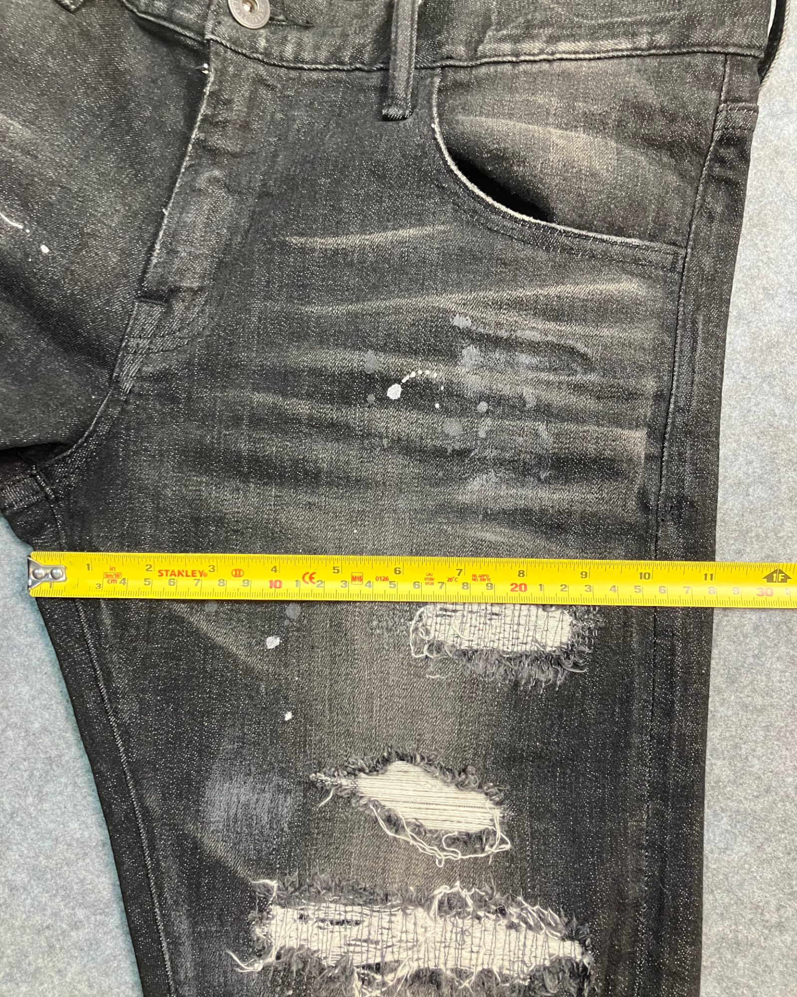 black distressed slim-fit jeans