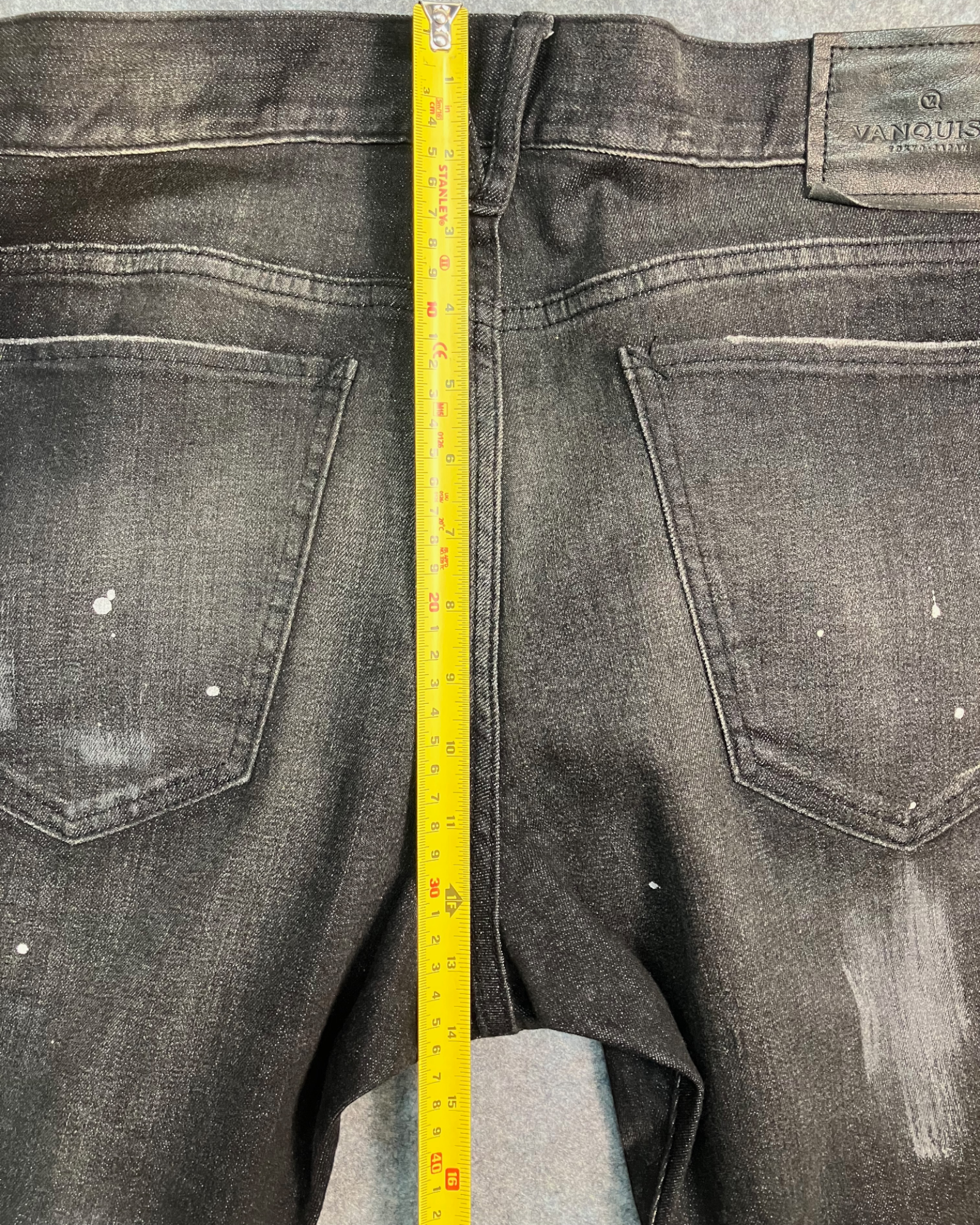 black distressed slim-fit jeans