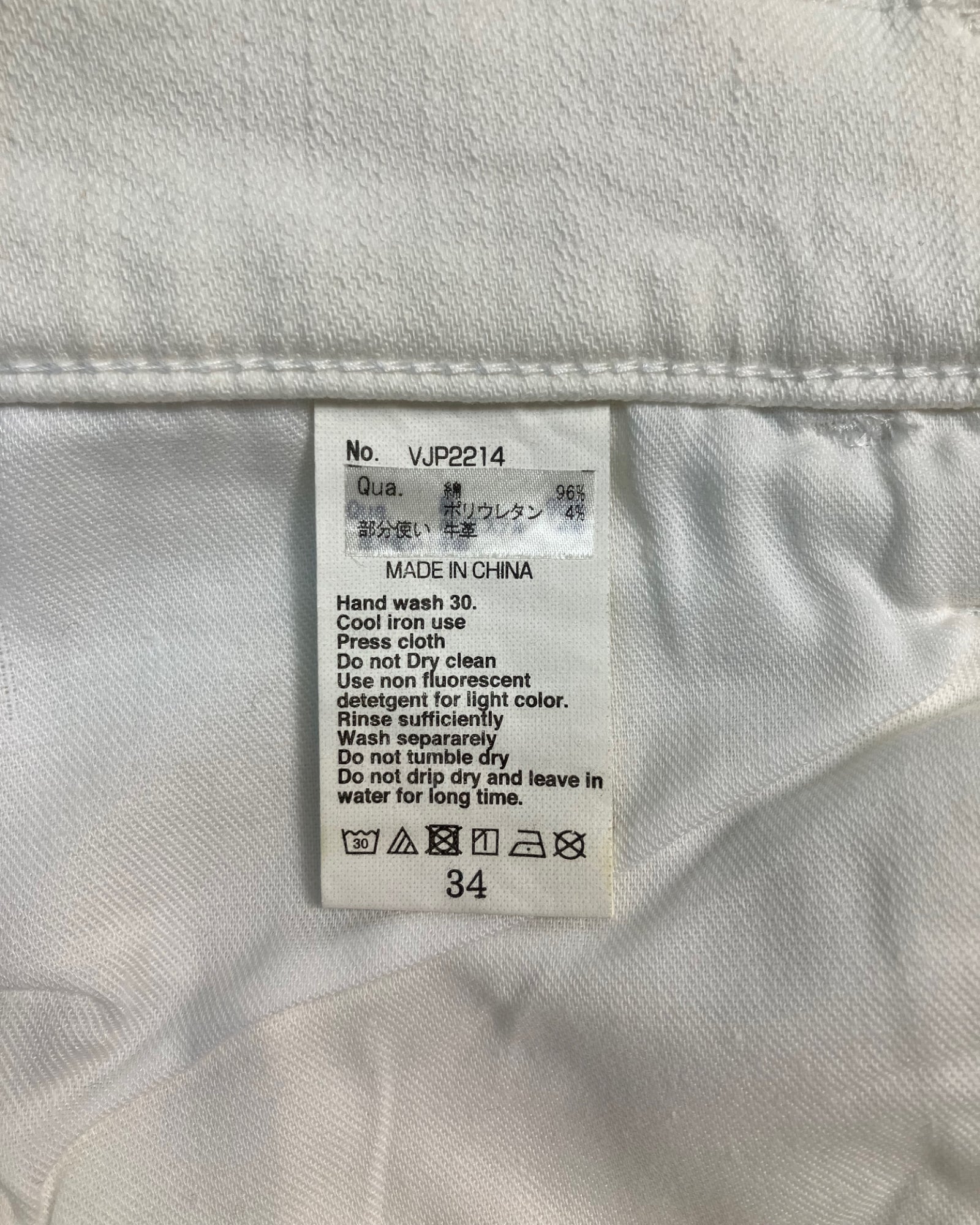 white distressed slim-fit jeans