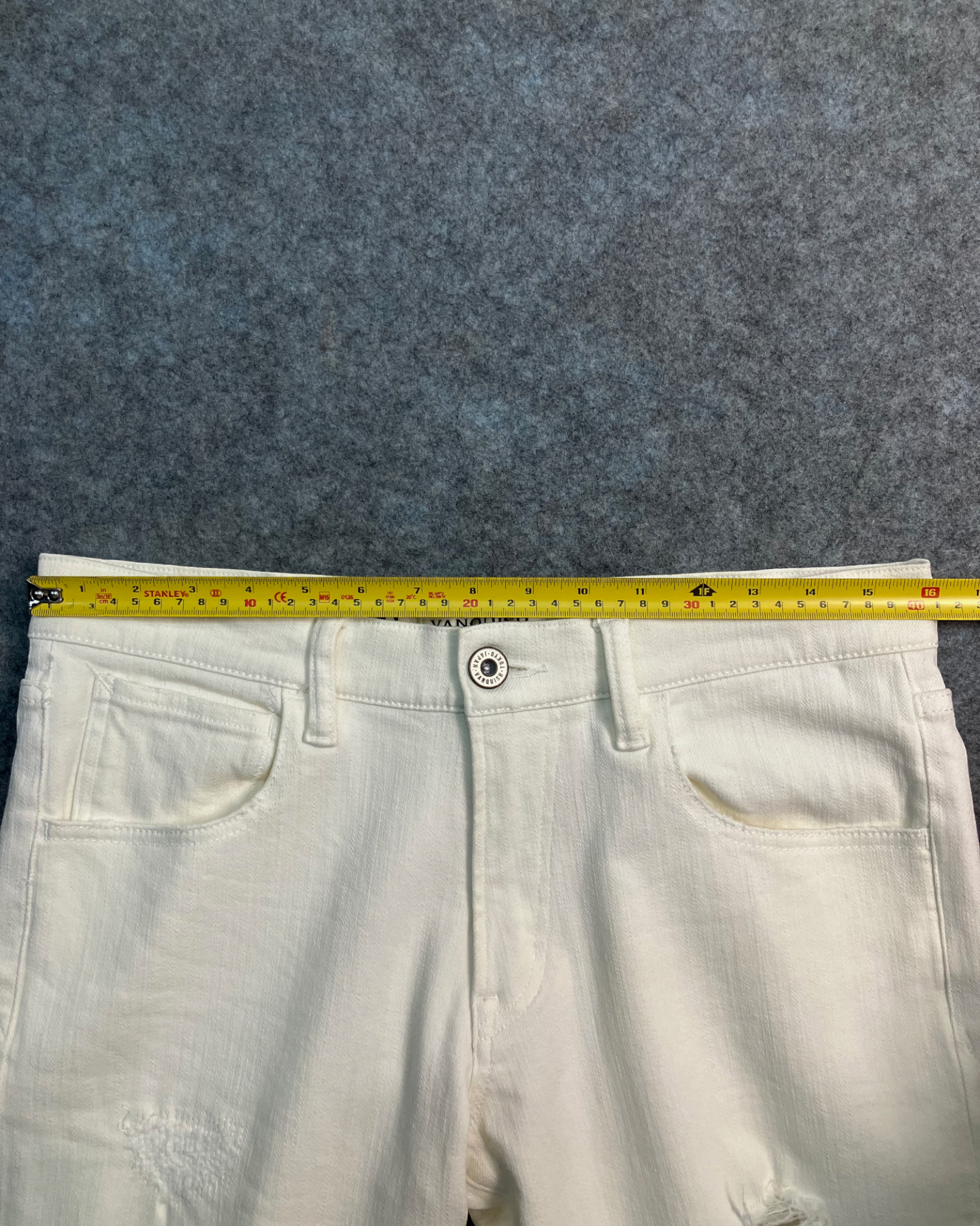 white distressed slim-fit jeans