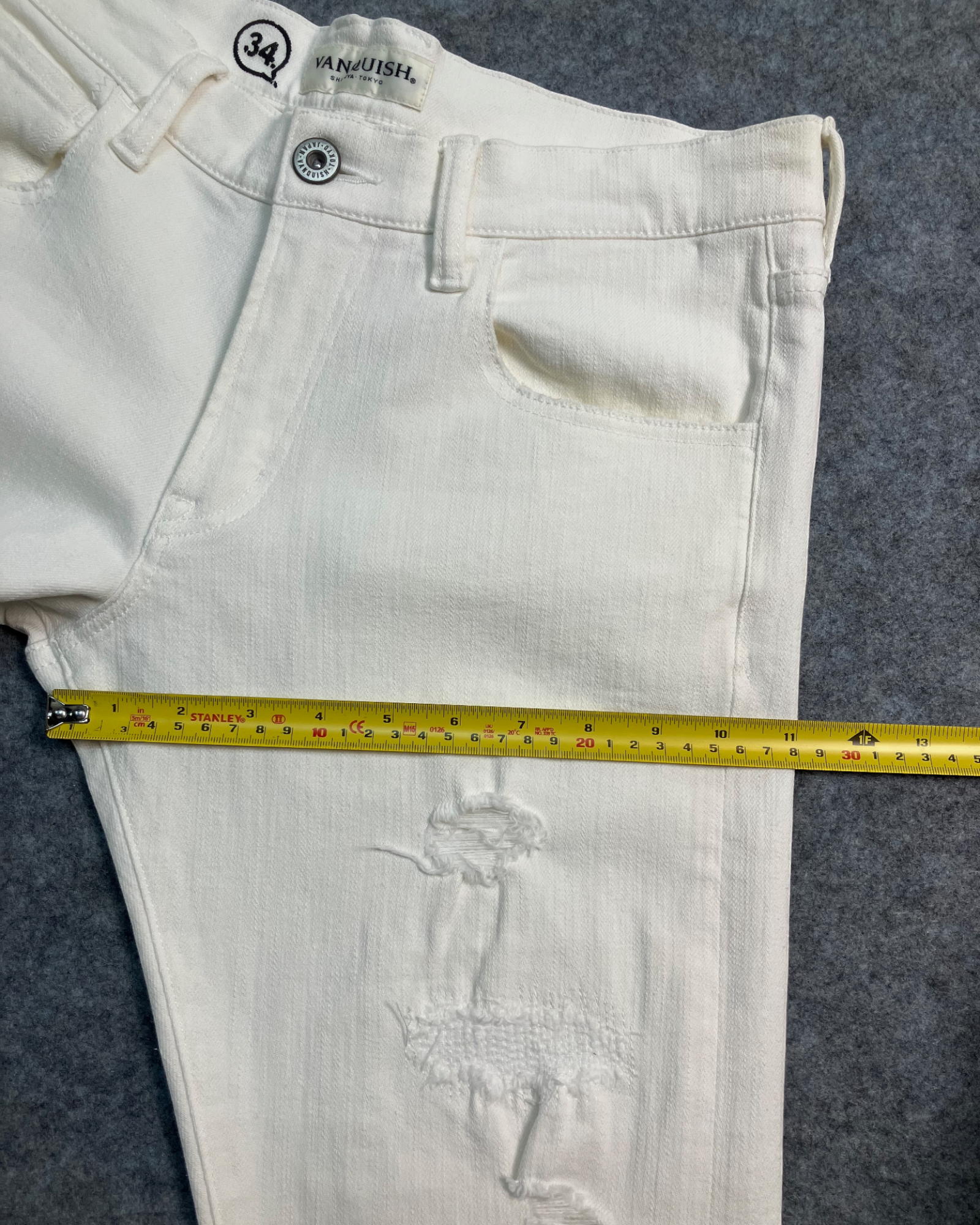 white distressed slim-fit jeans