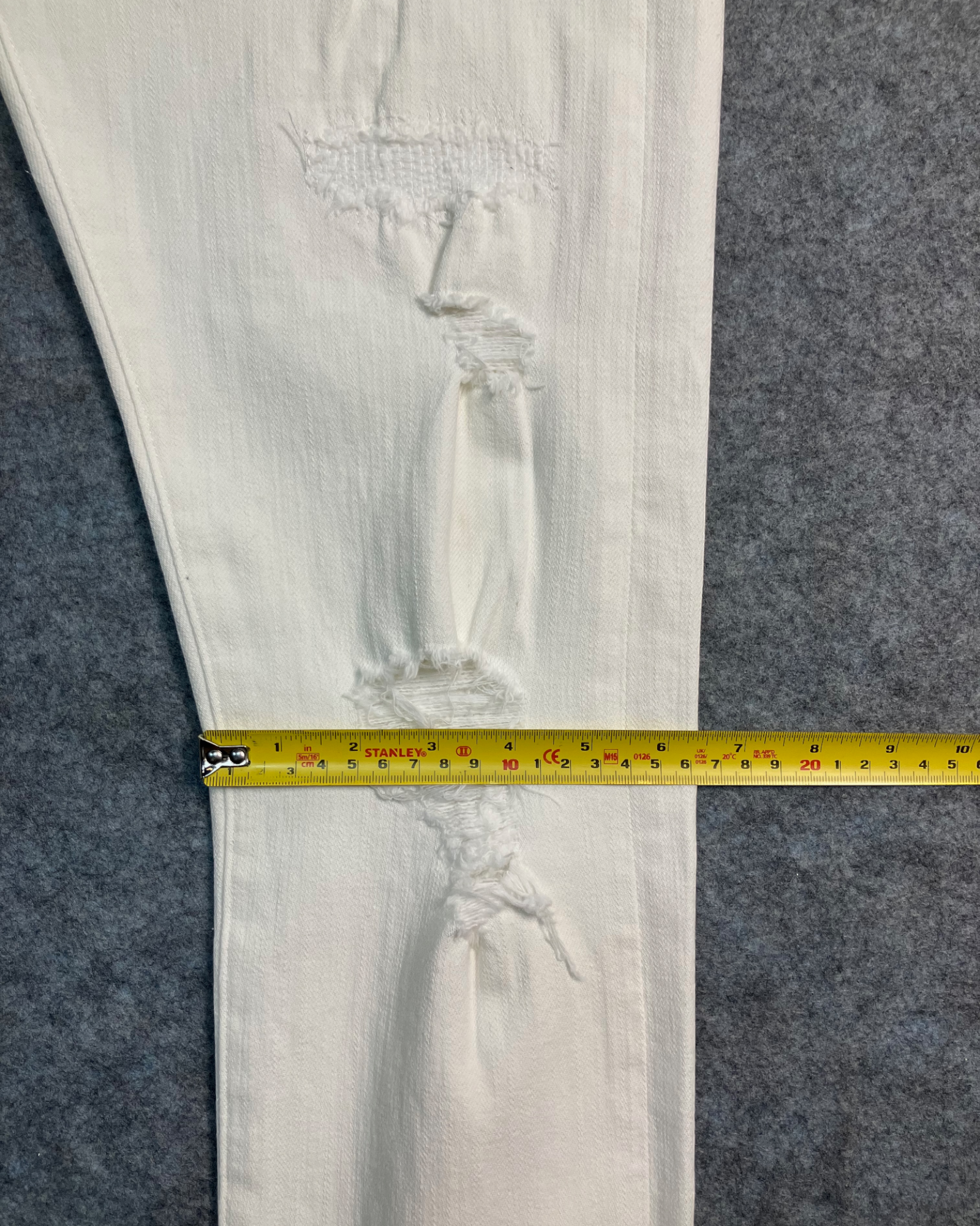 white distressed slim-fit jeans