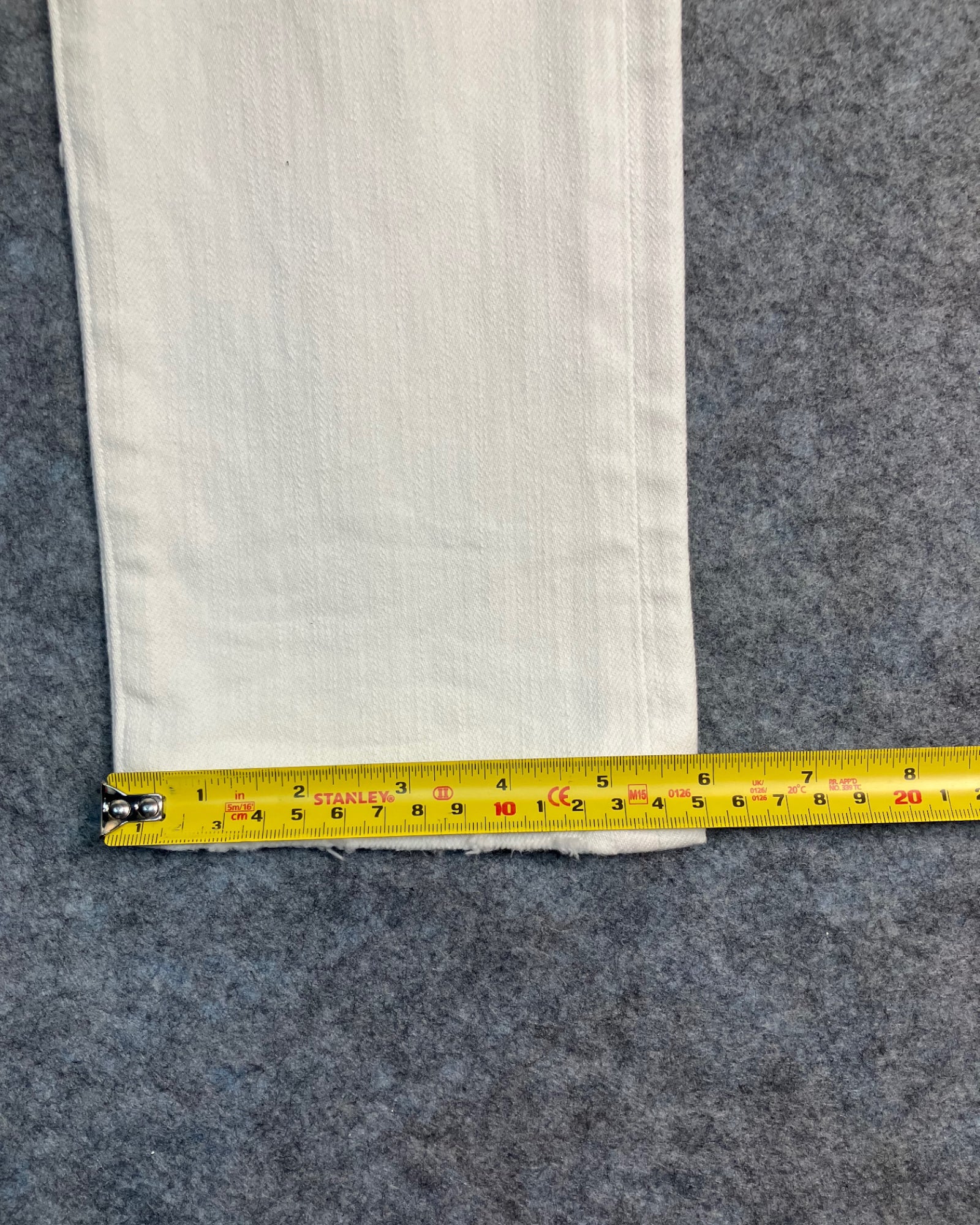 white distressed slim-fit jeans