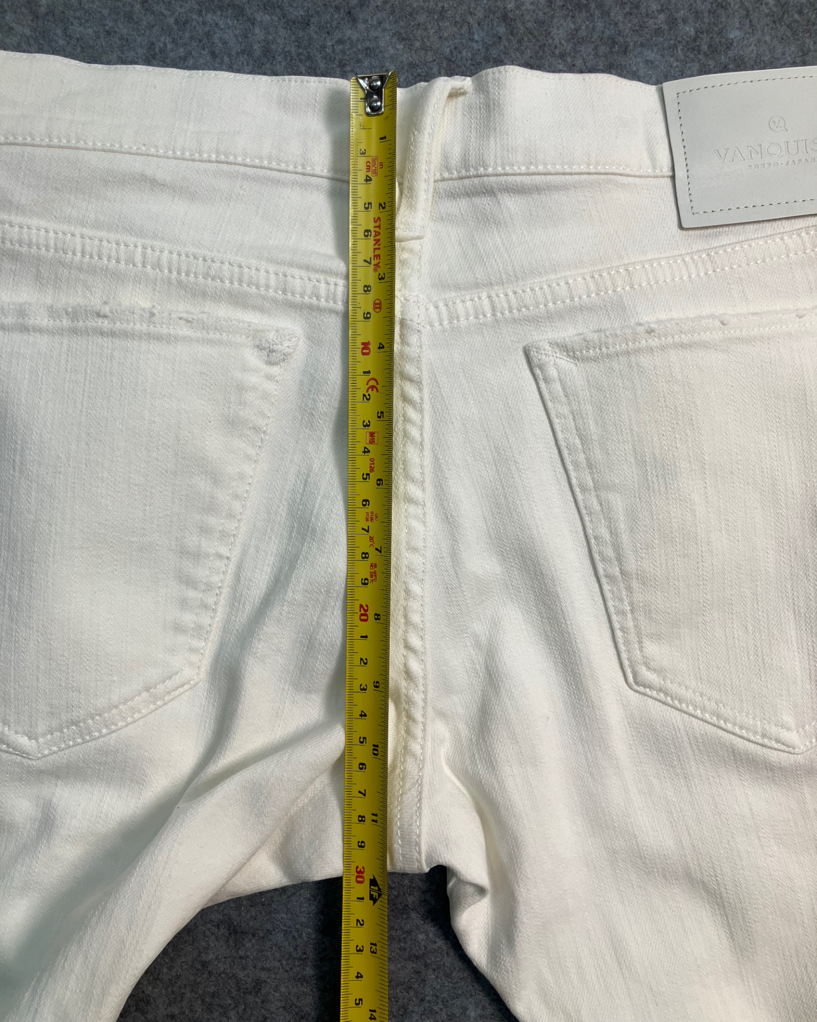 white distressed slim-fit jeans