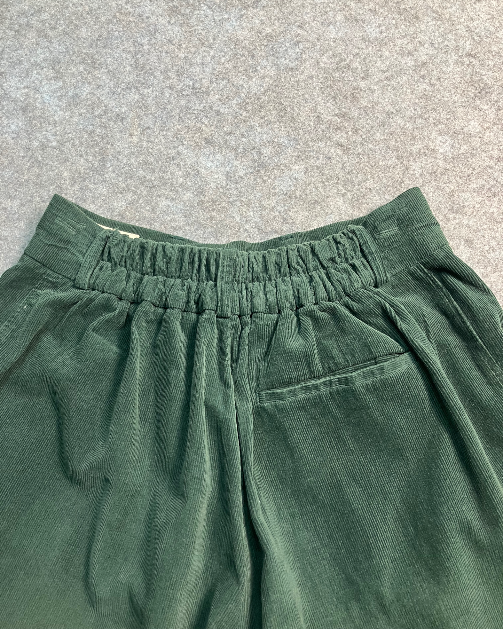 green corduroy balloon-pants