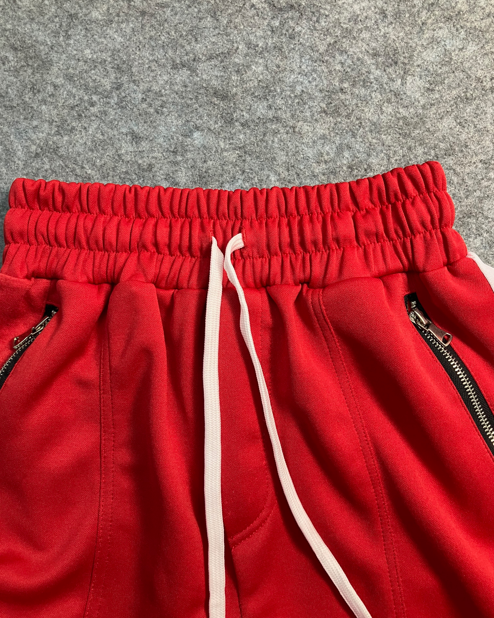 red slim-fit sweat pants