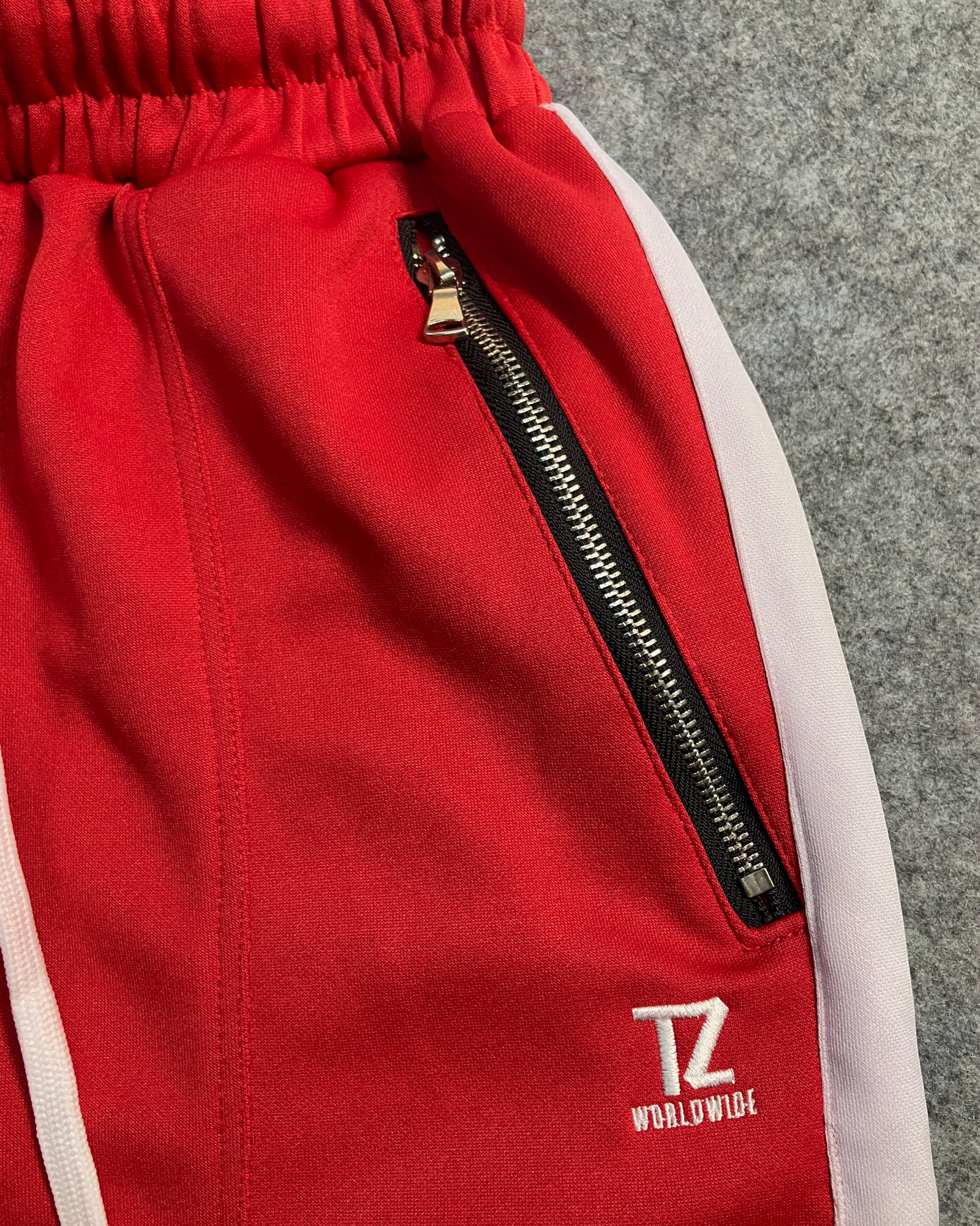 red slim-fit sweat pants