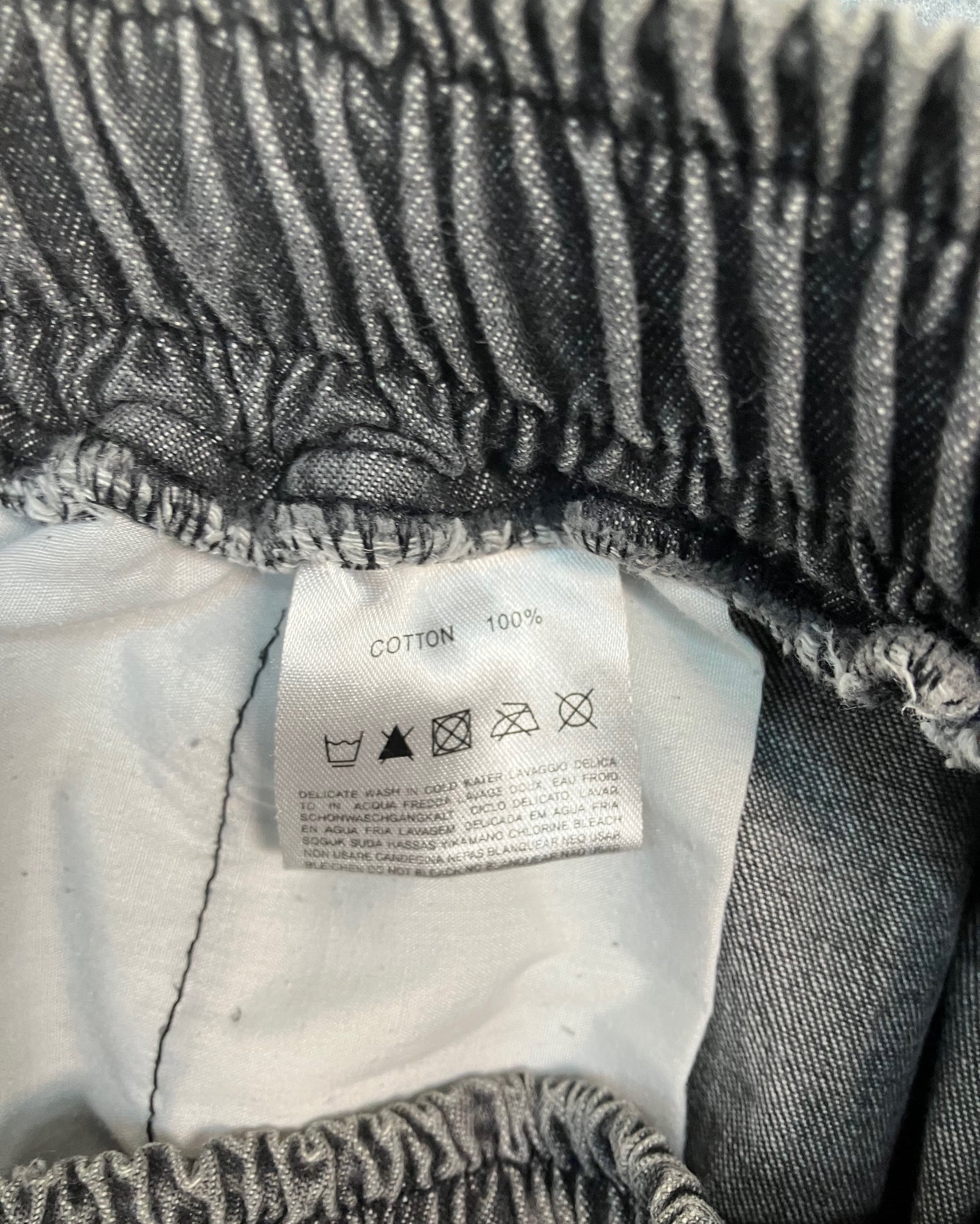 black cargo distressed shorts