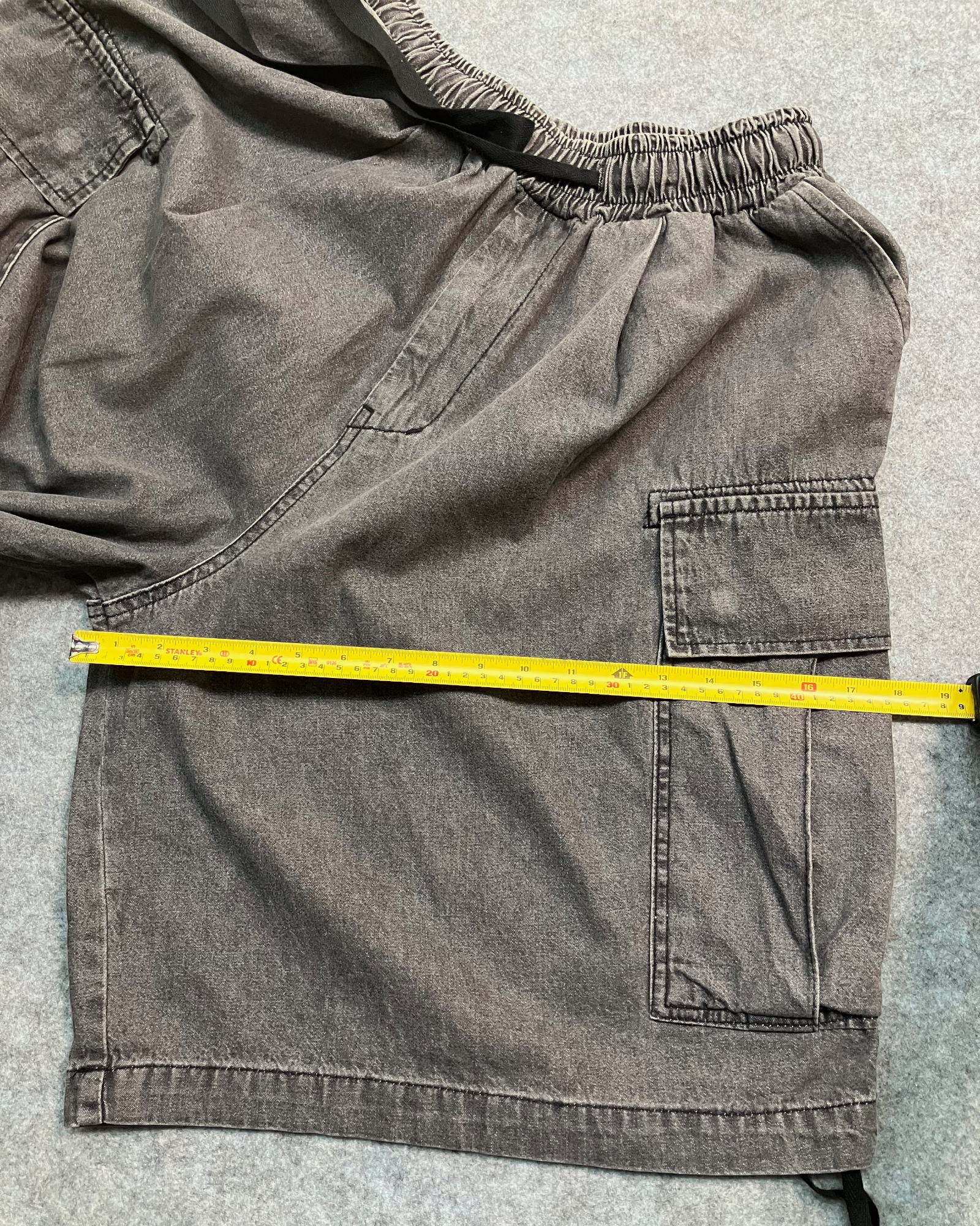 black cargo distressed shorts