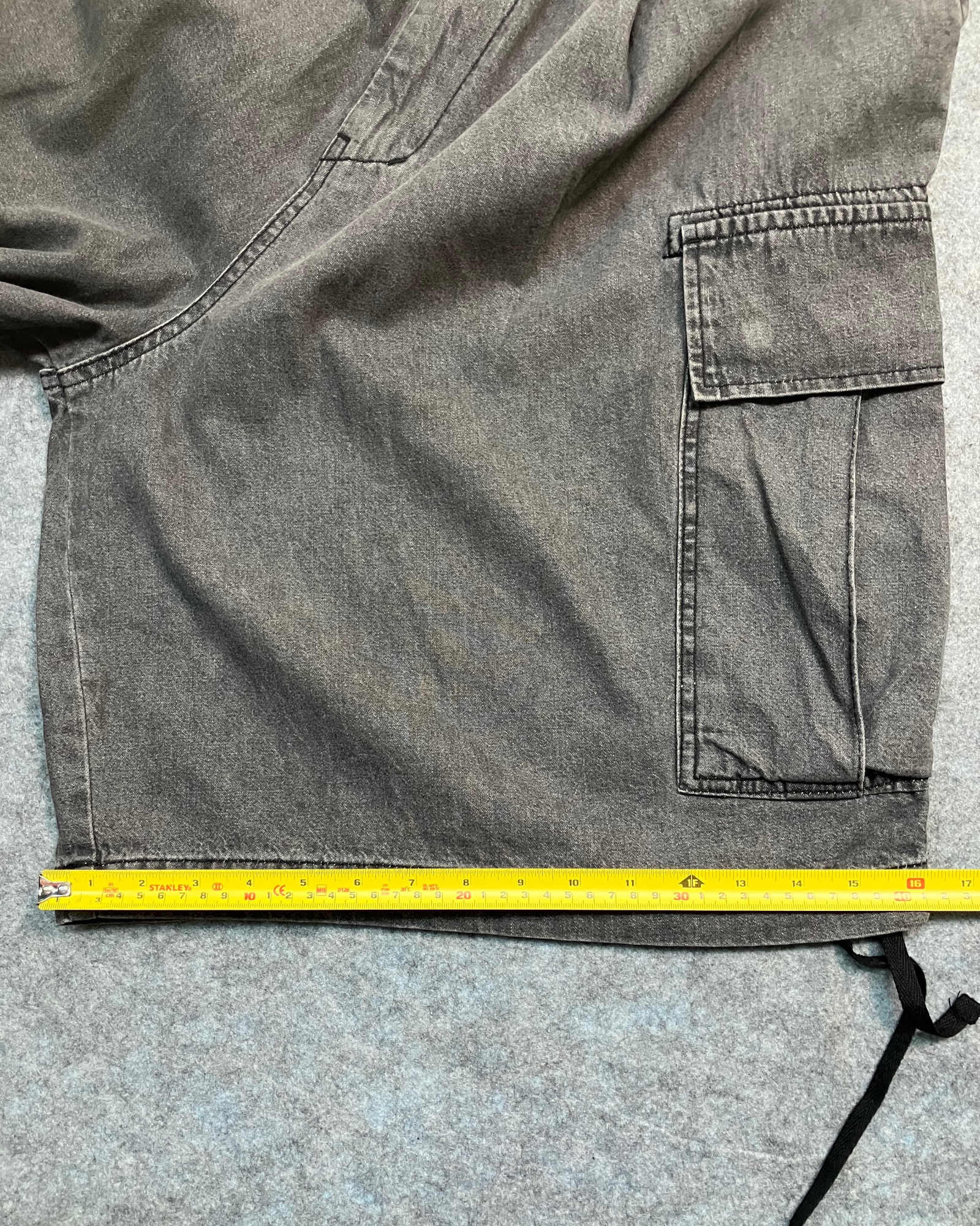 black cargo distressed shorts