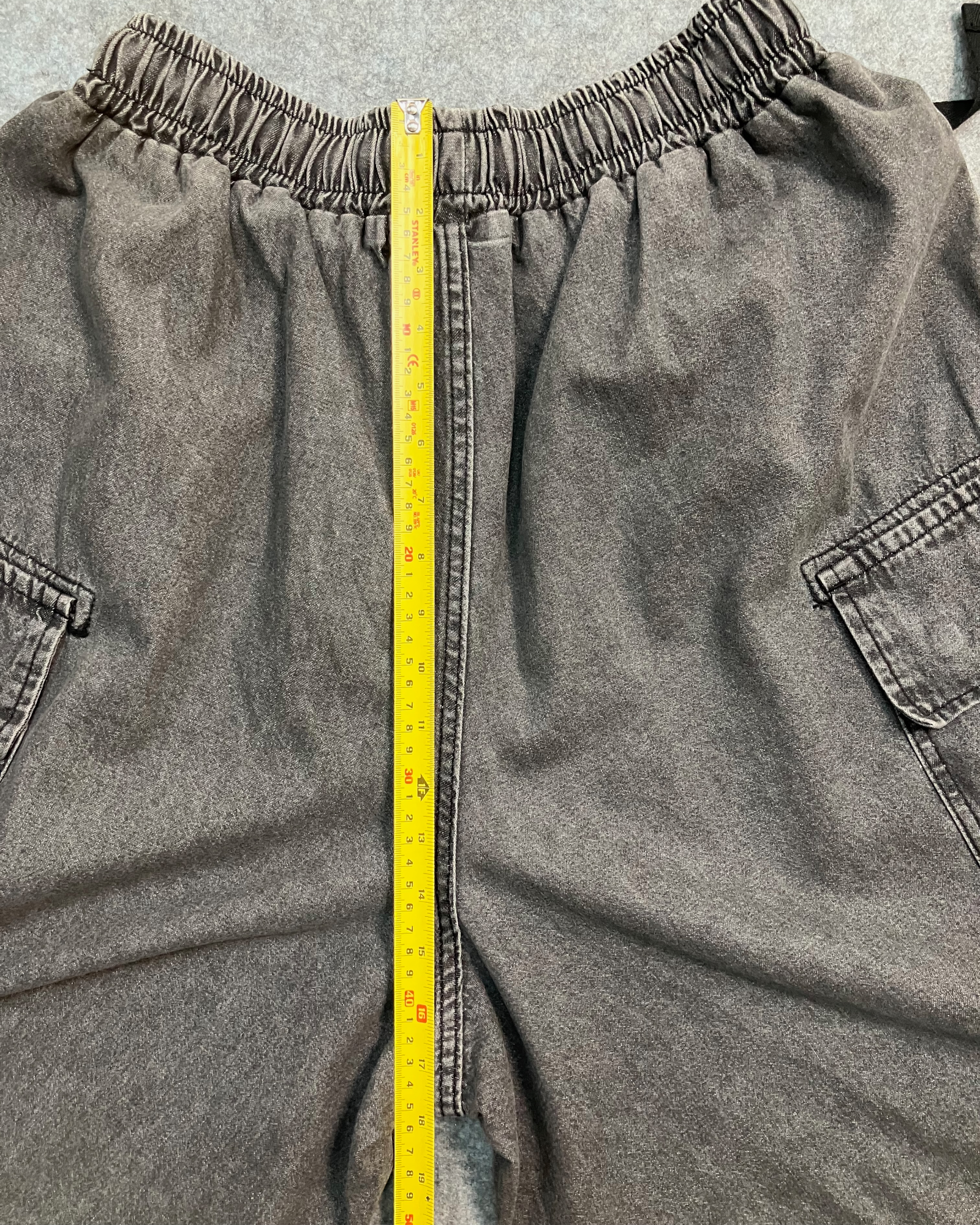 black cargo distressed shorts