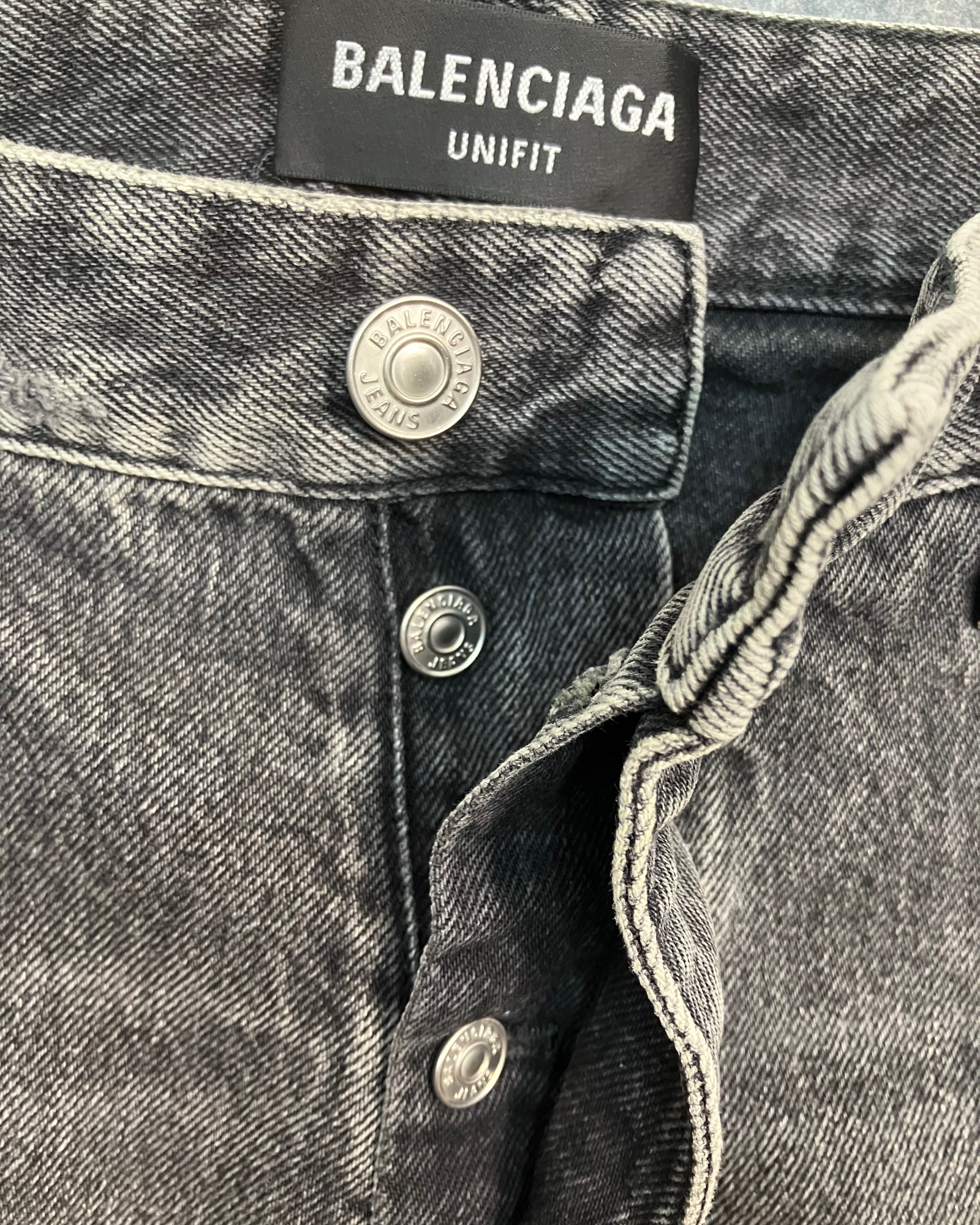 black denim distressed shorts