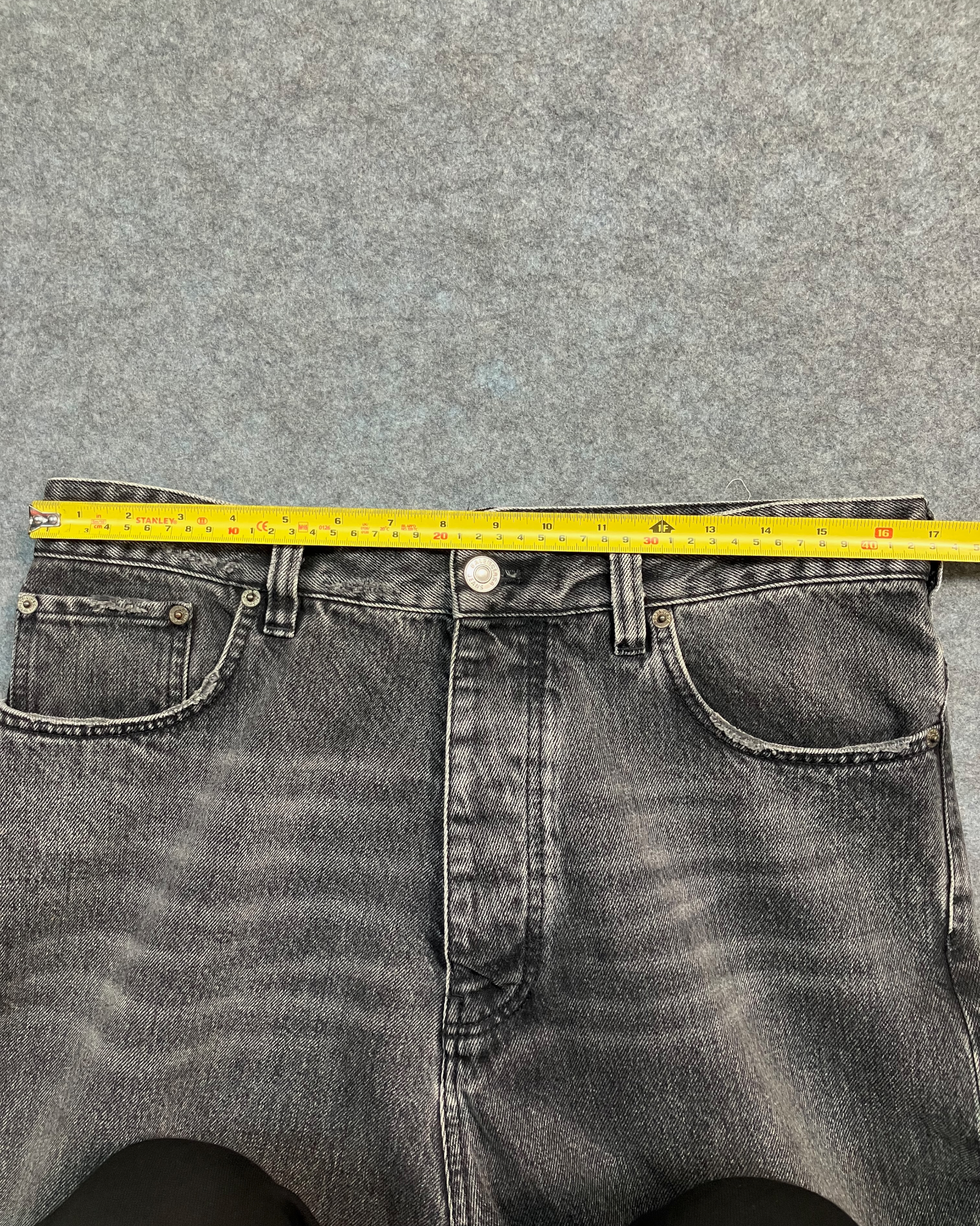 black denim distressed shorts