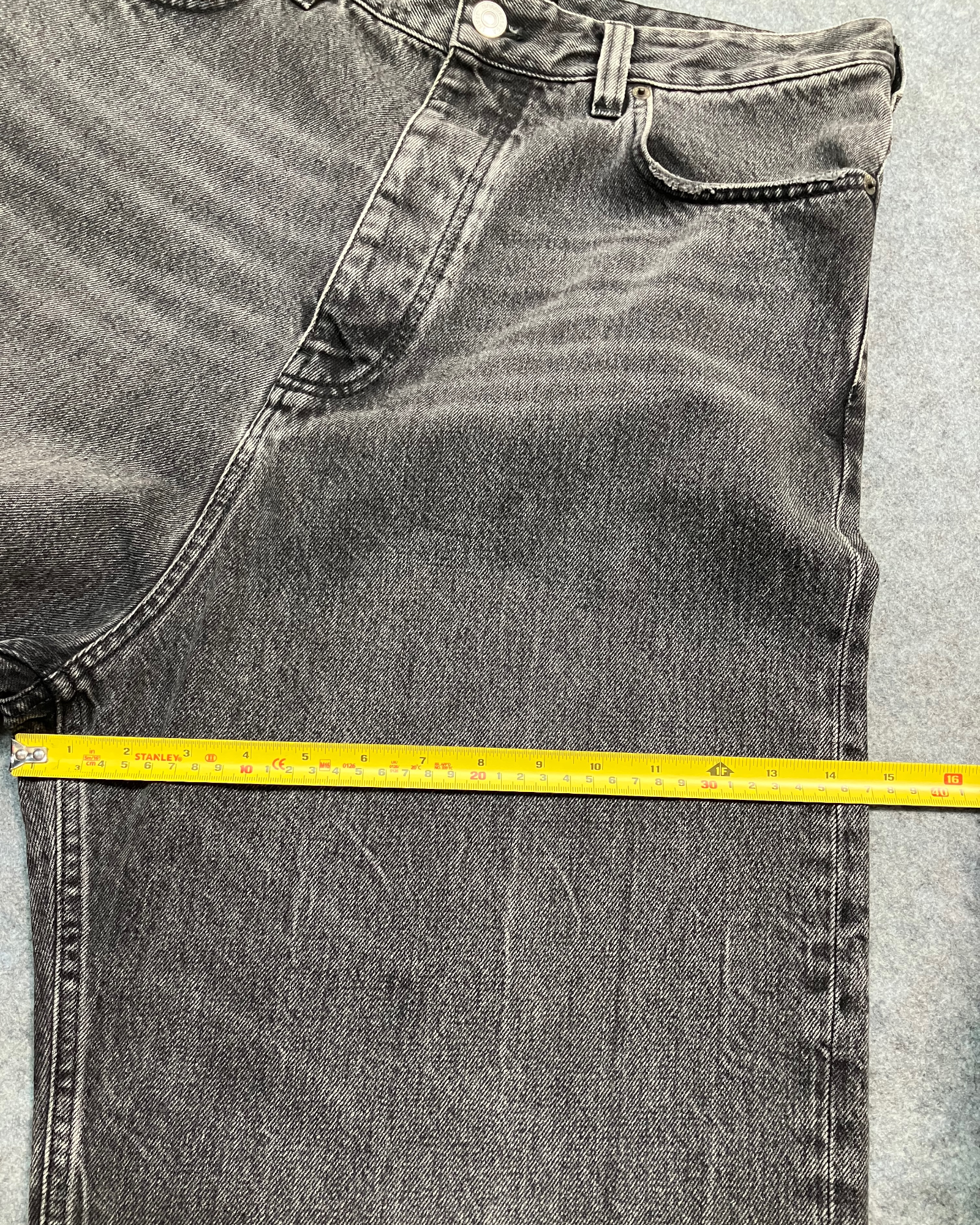 black denim distressed shorts